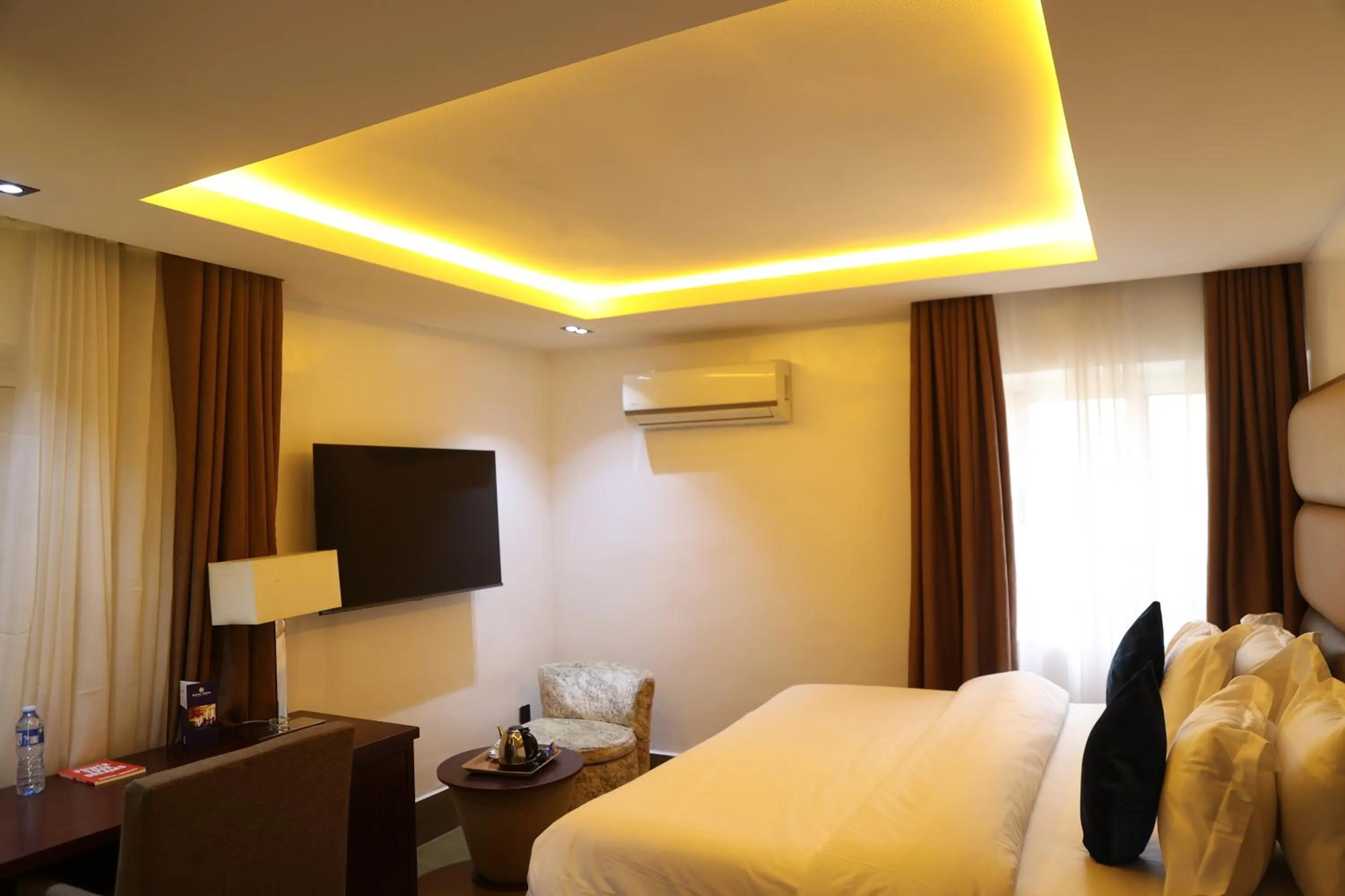 Bed in Bolton White Residence