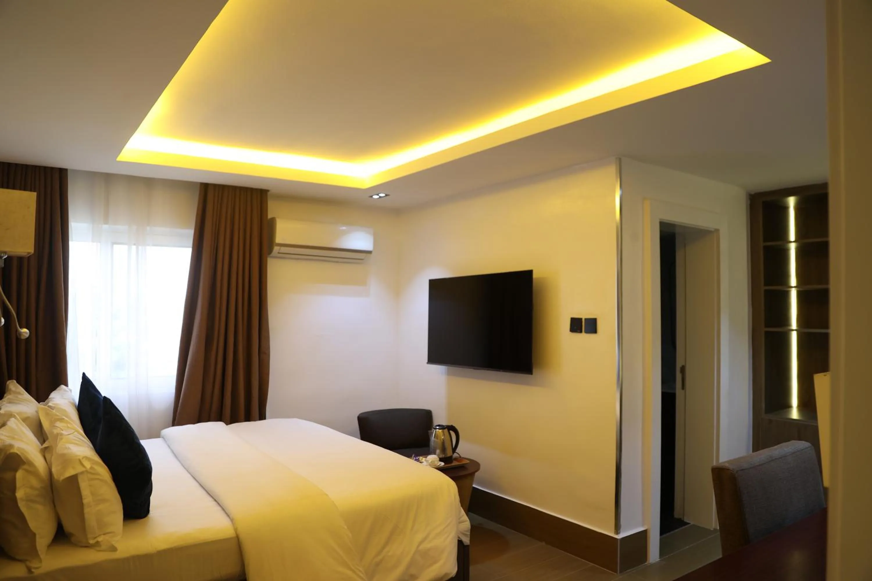 Bed in Bolton White Residence