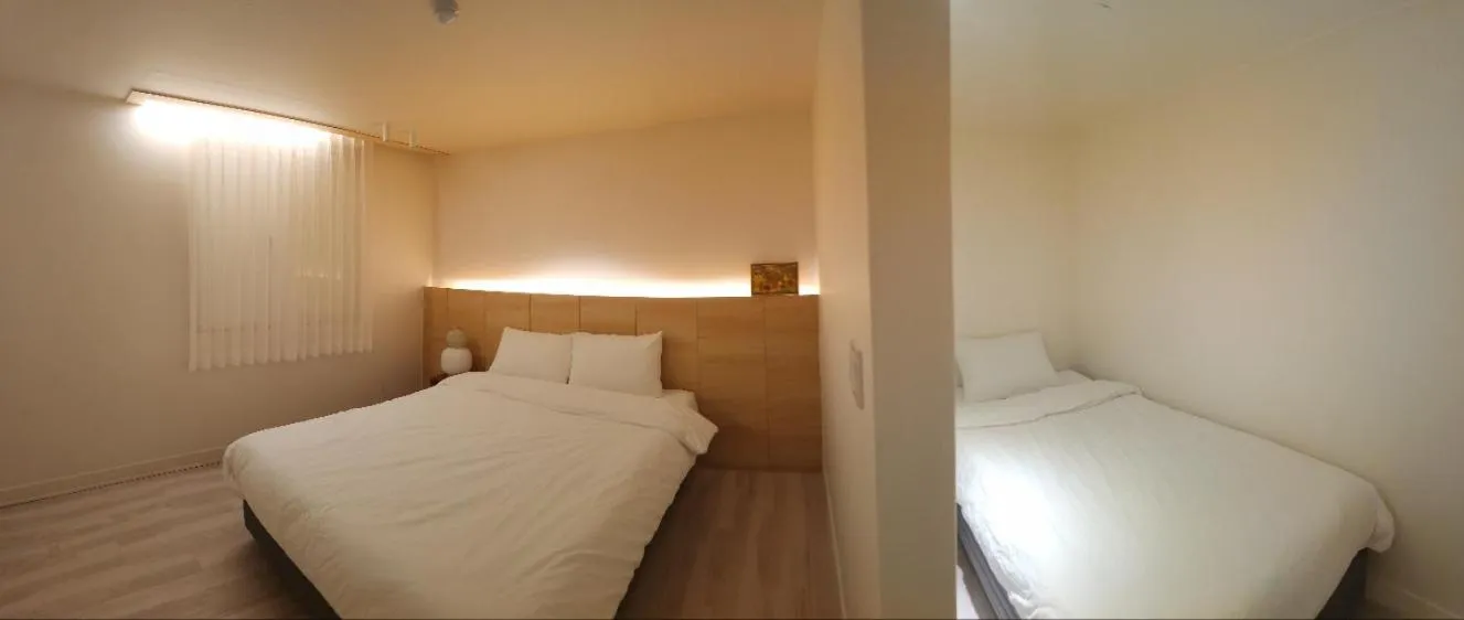 Bed in World House Hotel