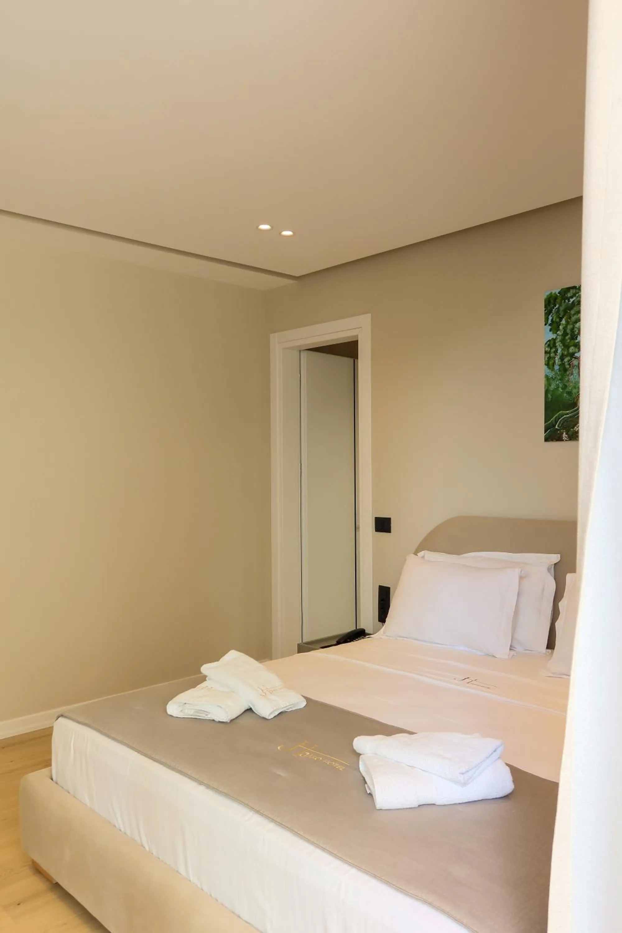 Bed in Jako Premium Hotel