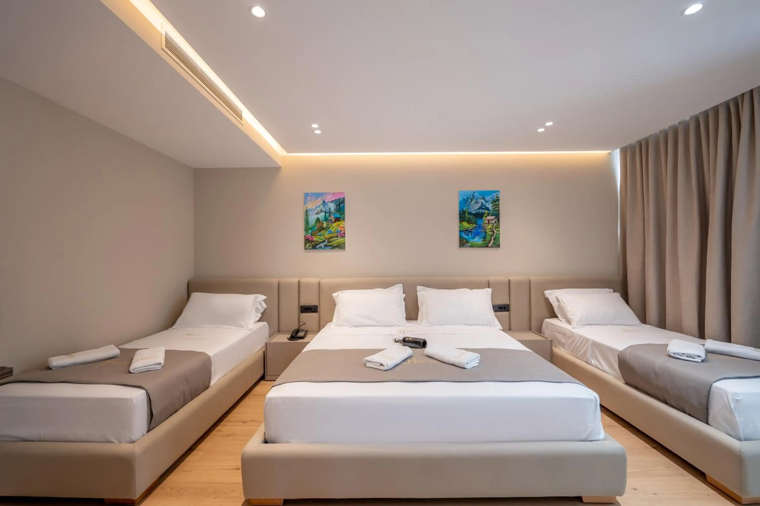 Bed in Jako Premium Hotel