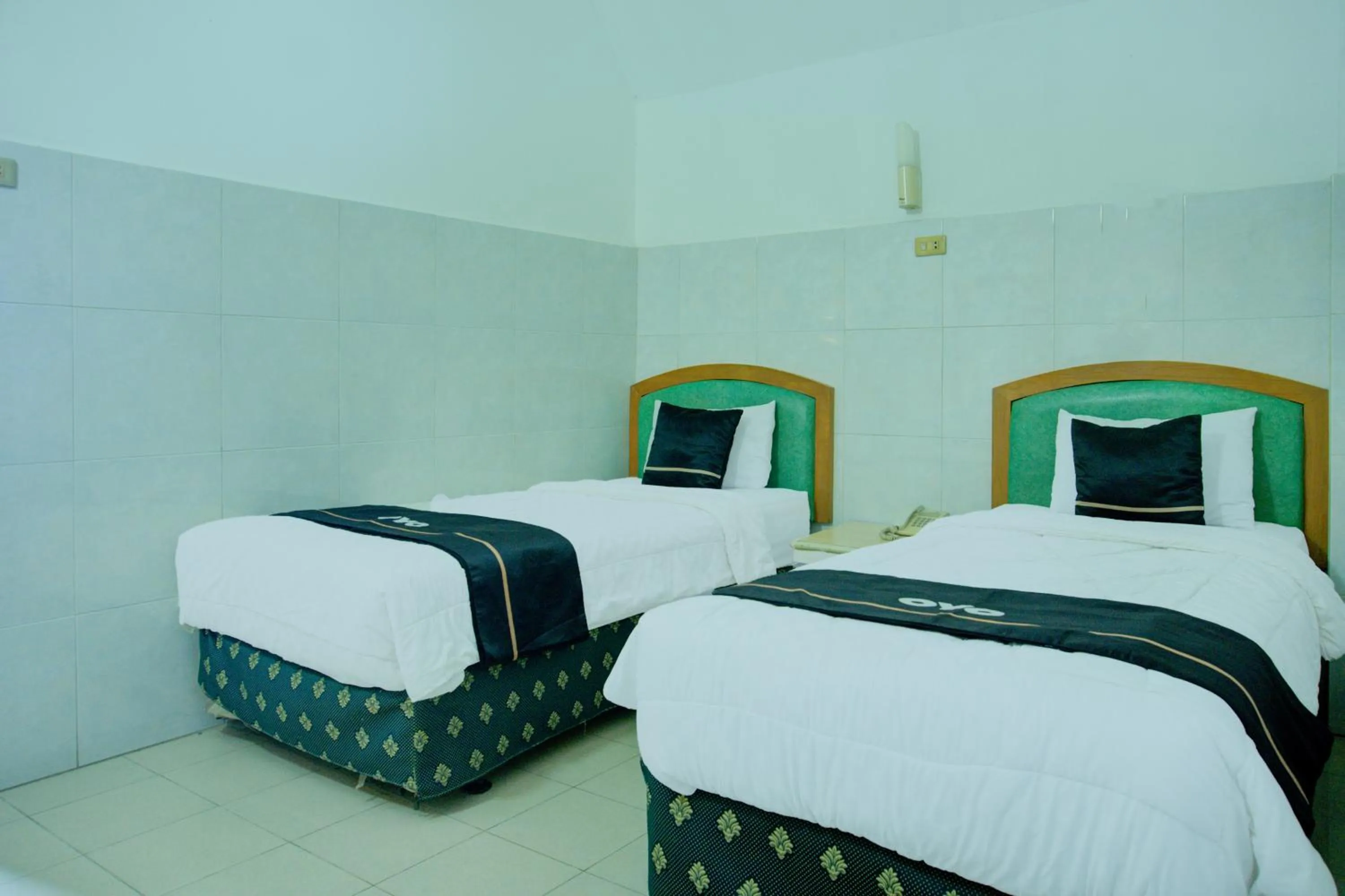 Bedroom, Bed in Townhouse Oak Palembang Near Jembatan Ampera Formerly Azzura Hotel
