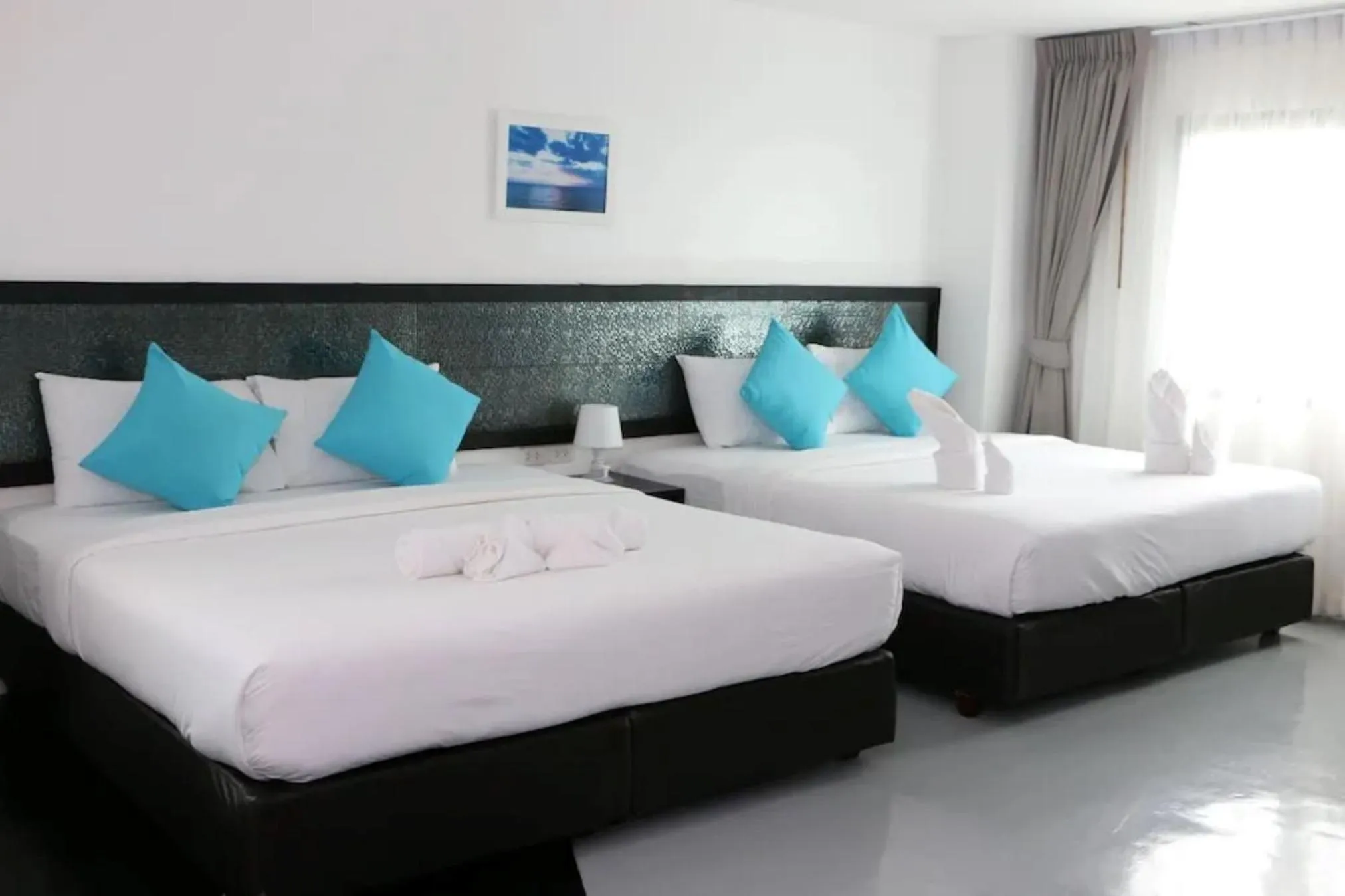 Photo of the whole room, Bed in The Regizt Jomtien Pattaya