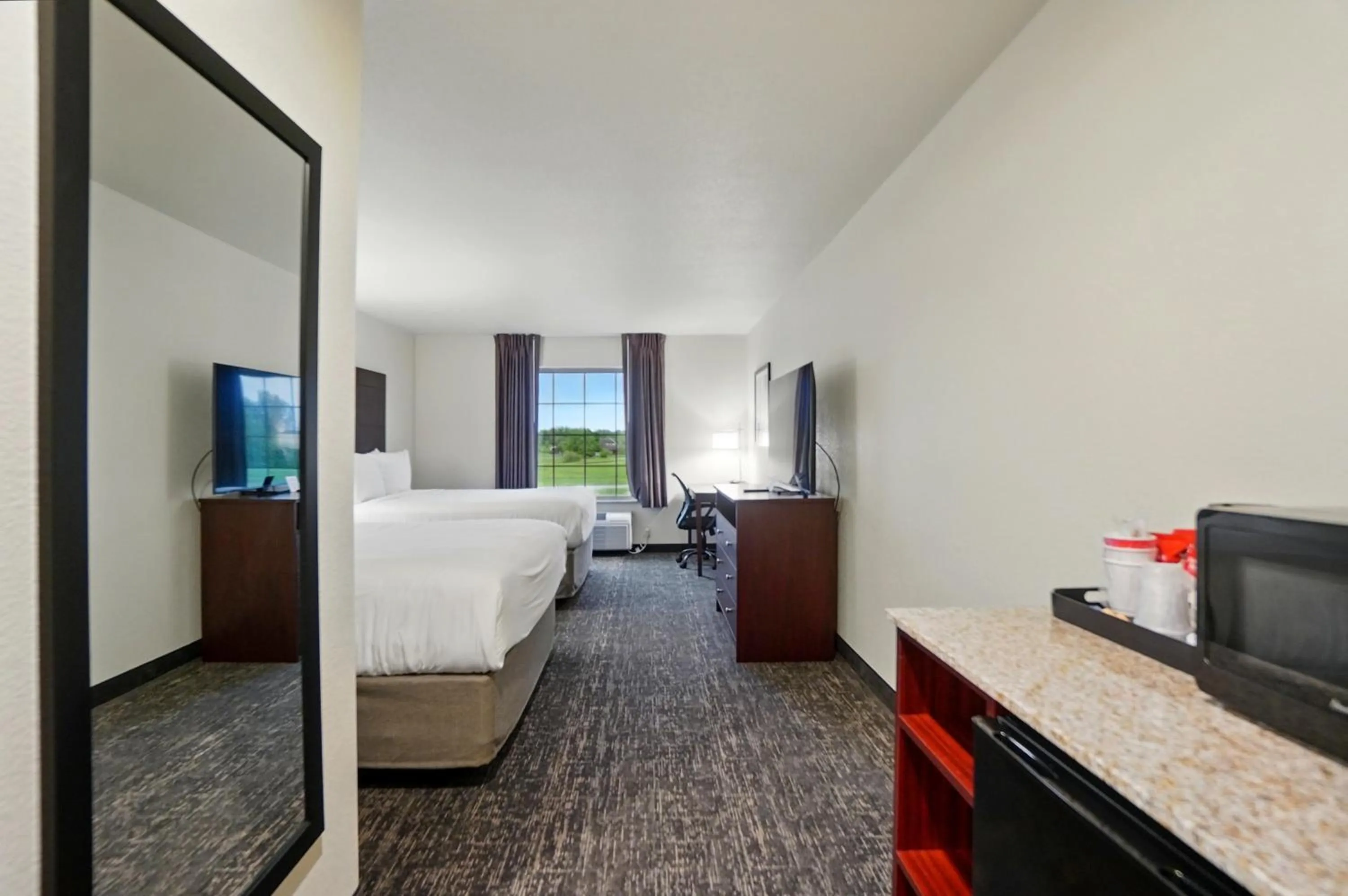 Bed in Cobblestone Hotel & Suites - Eaton