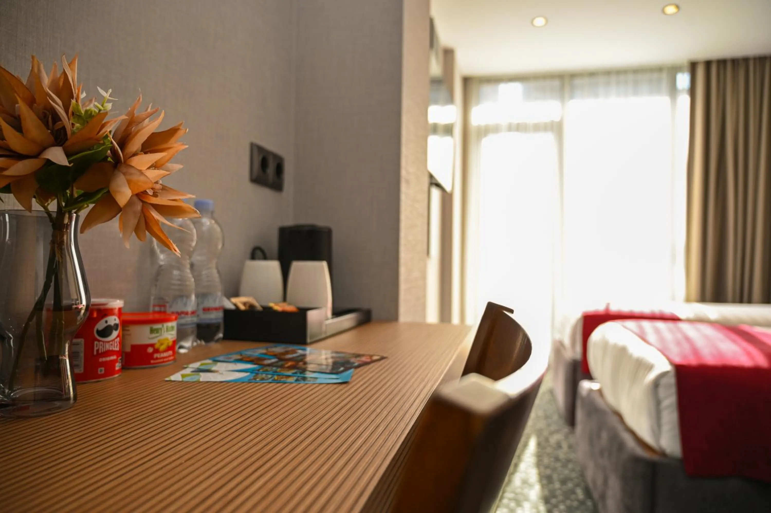 Seating area, Bed in Landmark Hotel