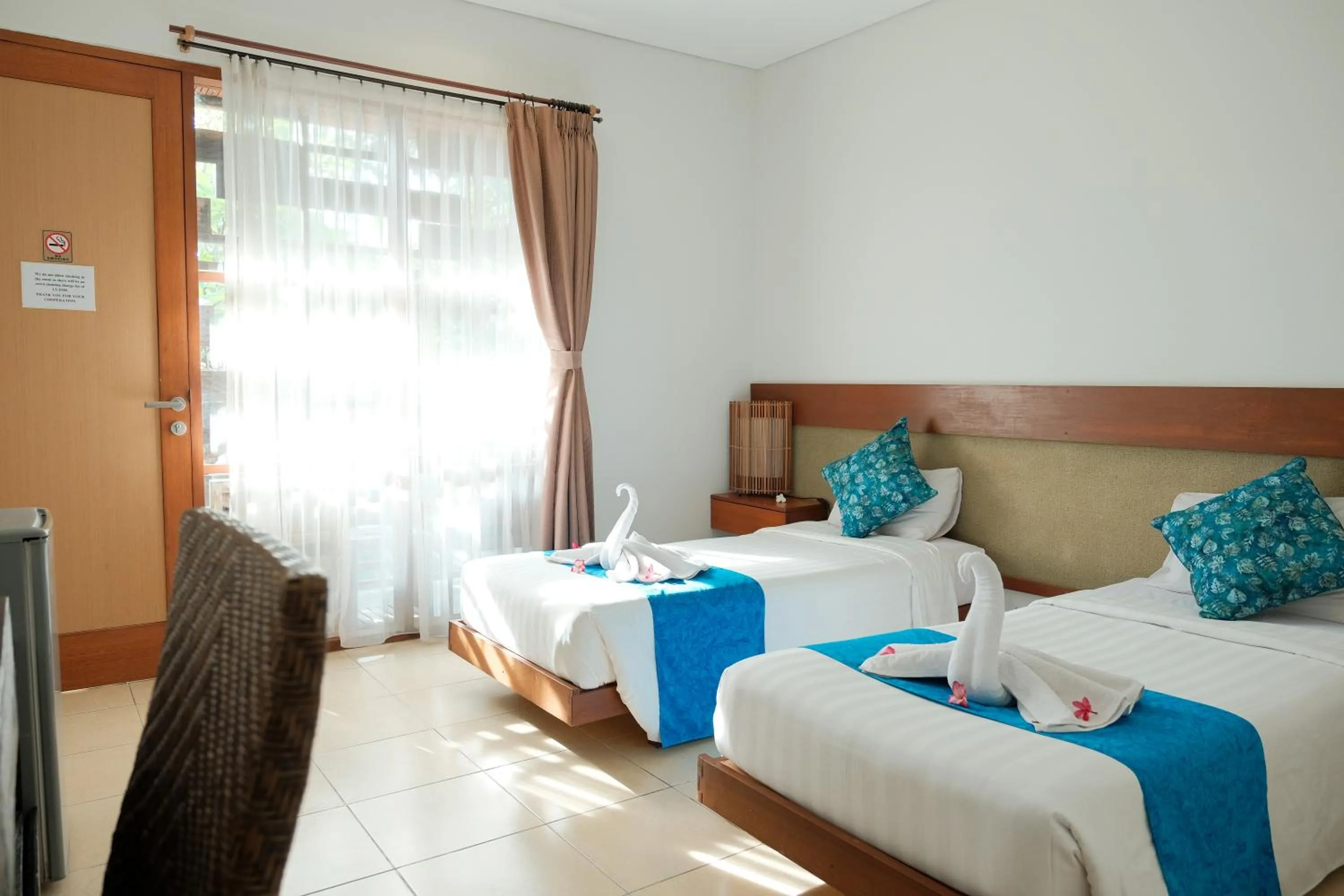 Bed in Semarandana Bedrooms and Pool