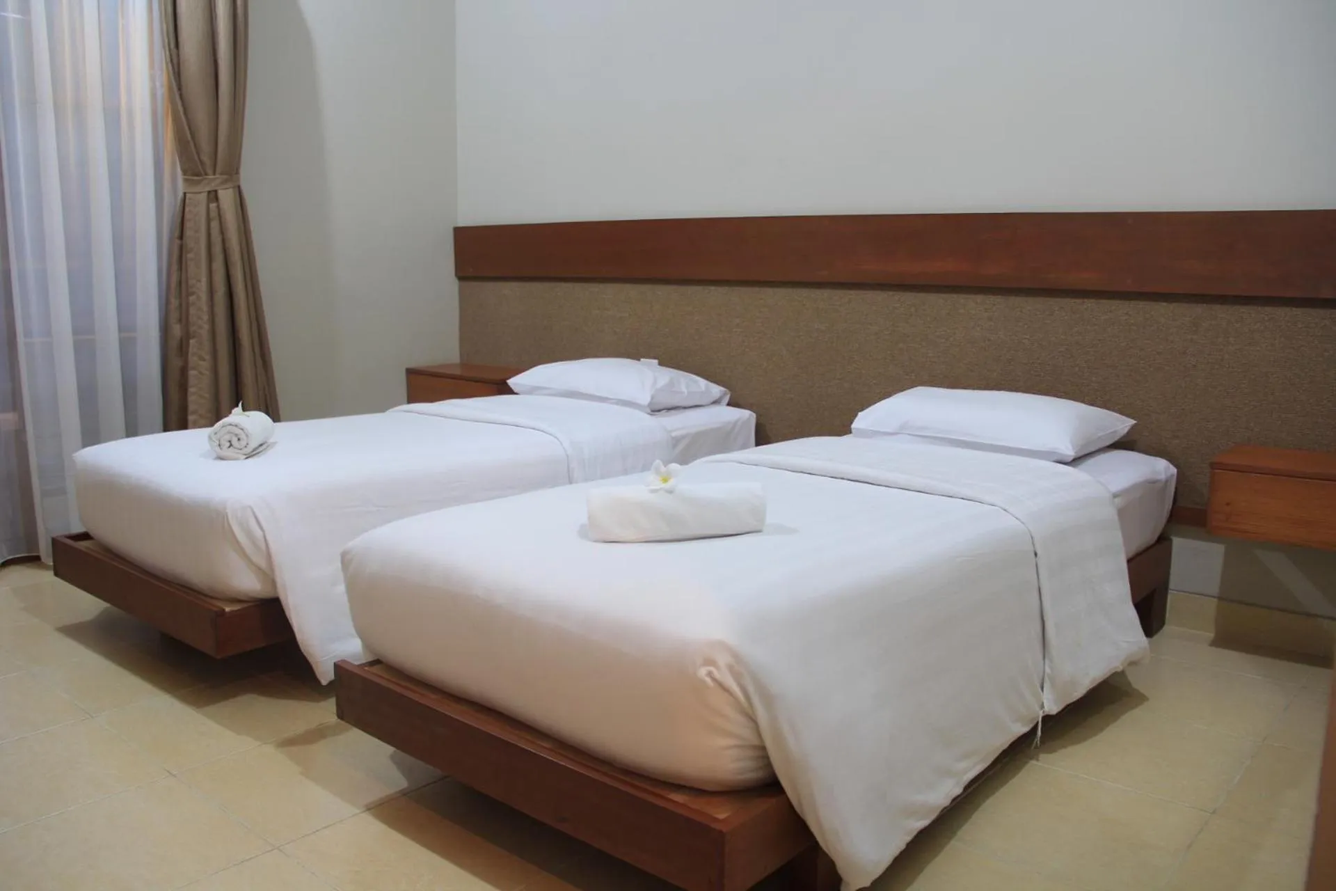 Bed in Semarandana Bedrooms and Pool