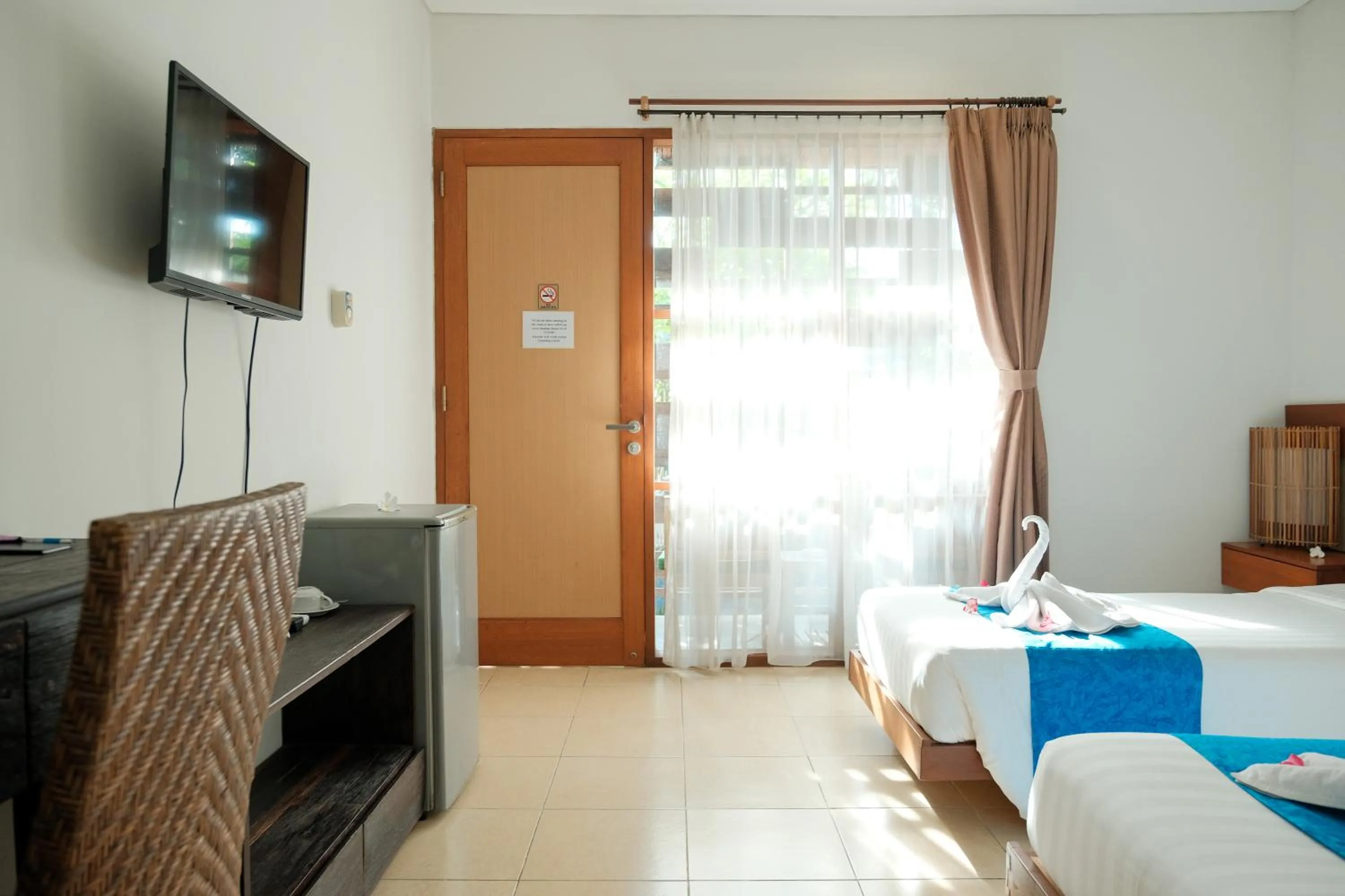 Communal lounge/ TV room, Bed in Semarandana Bedrooms and Pool