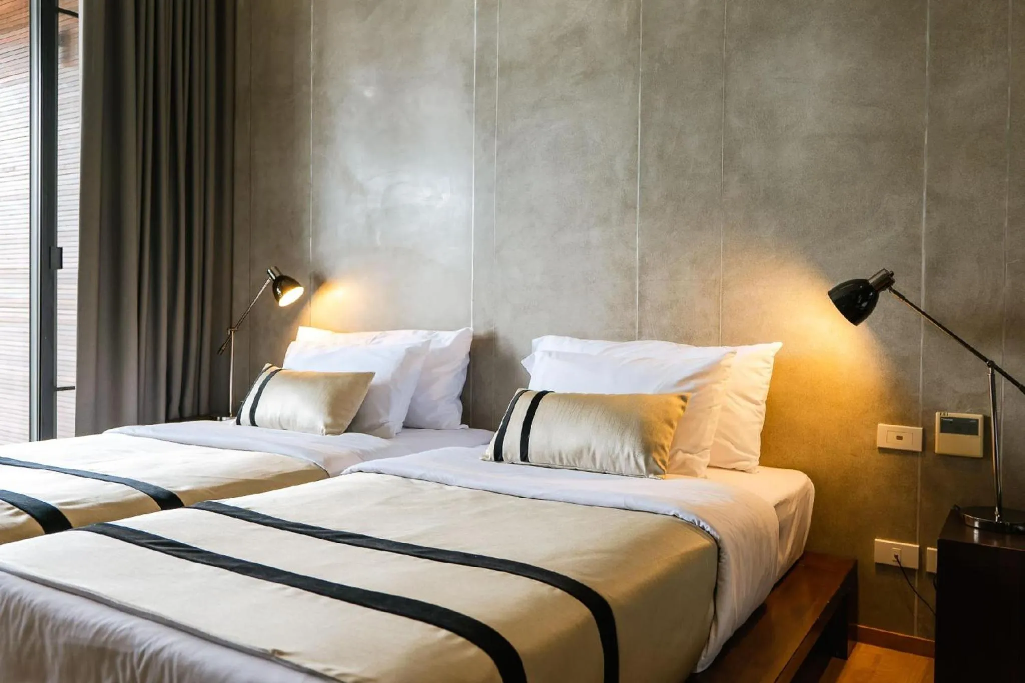 Bed in atta Lakeside Resort Suite - SHA Plus Certified