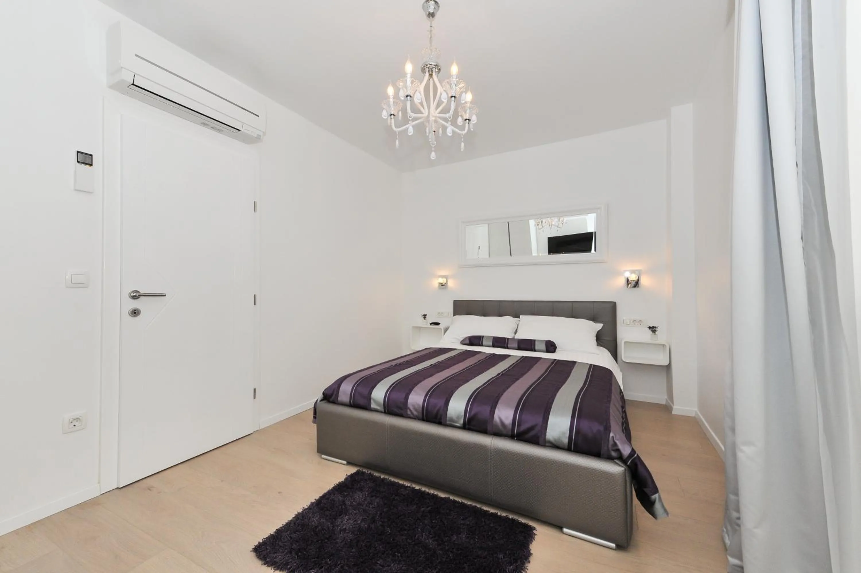 Bed in Luka Residence Apartments