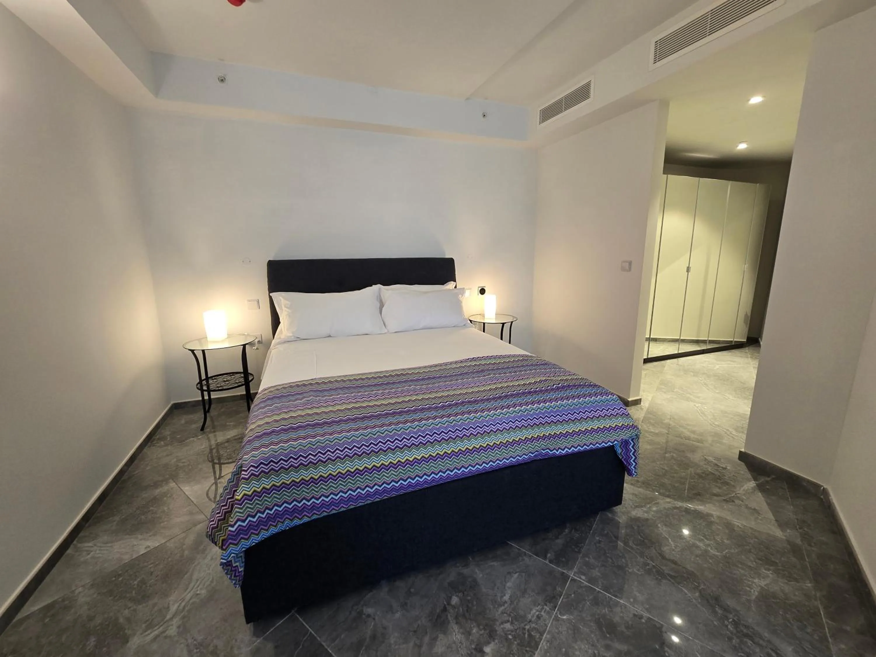 Bed in Mercury Suites - Skydream Getaways