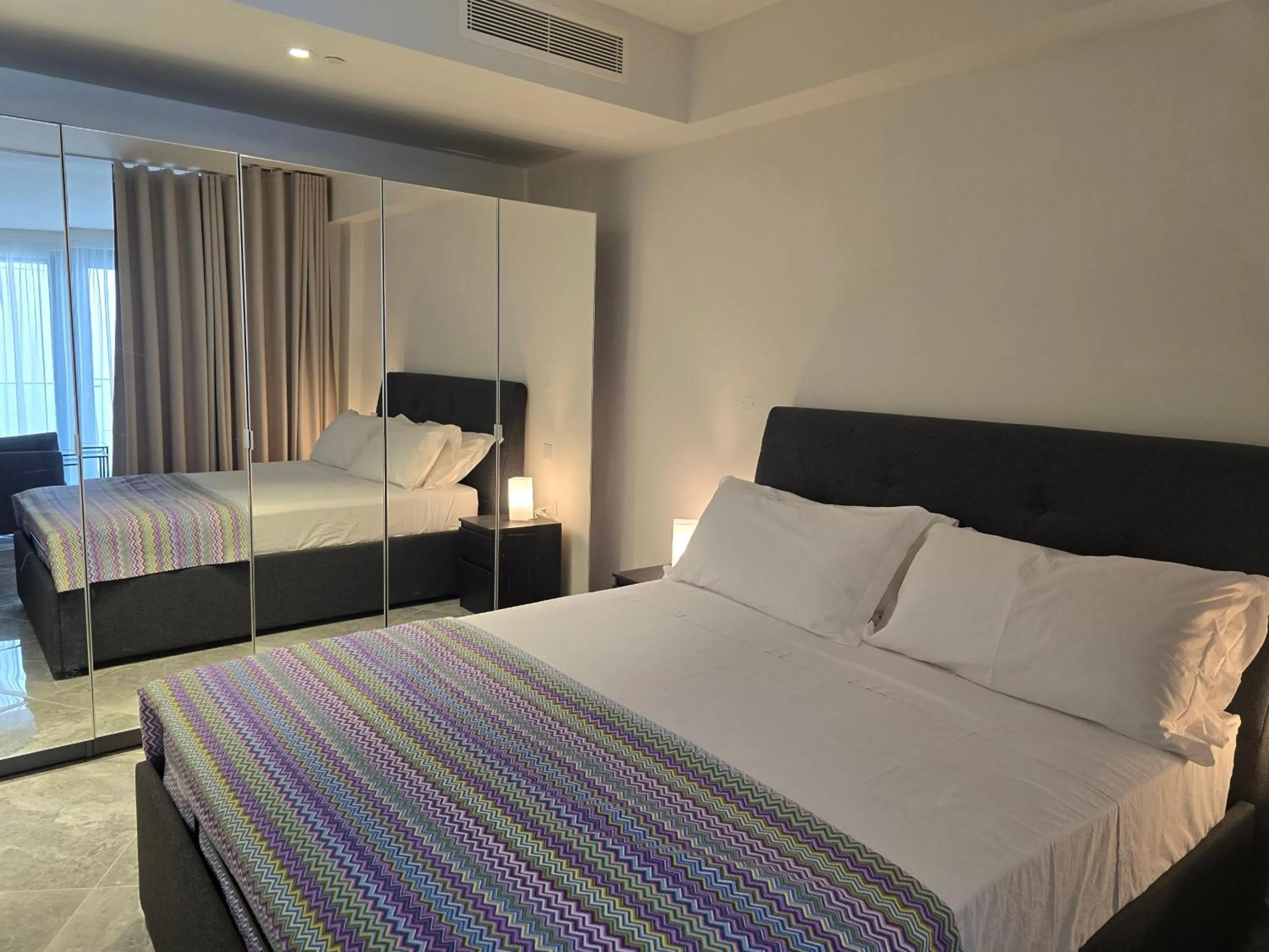 Photo of the whole room, Bed in Mercury Suites - Skydream Getaways