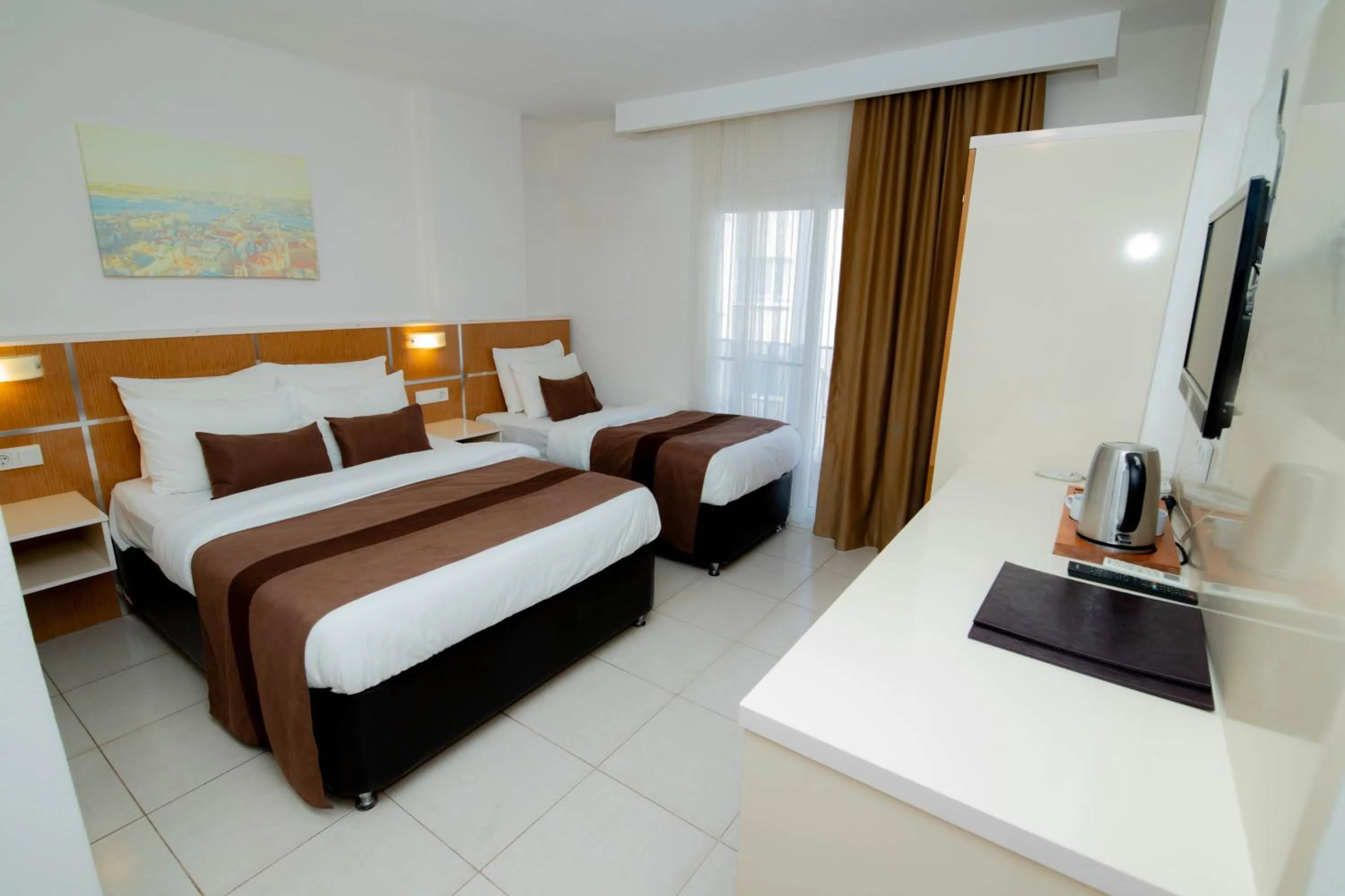 Bed in Palm Beach Hotel