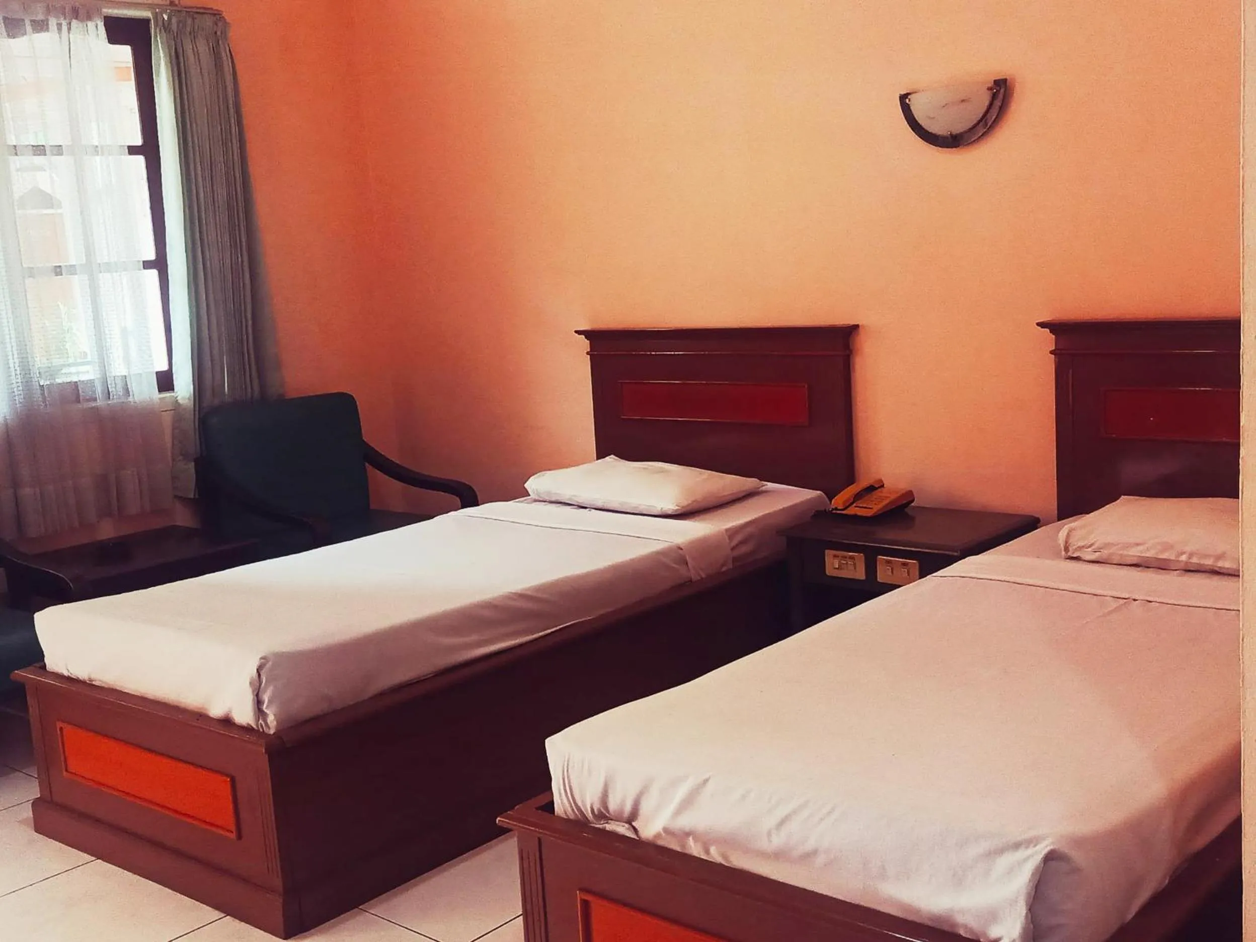 Bed in Hotel Wijaya Purwokerto