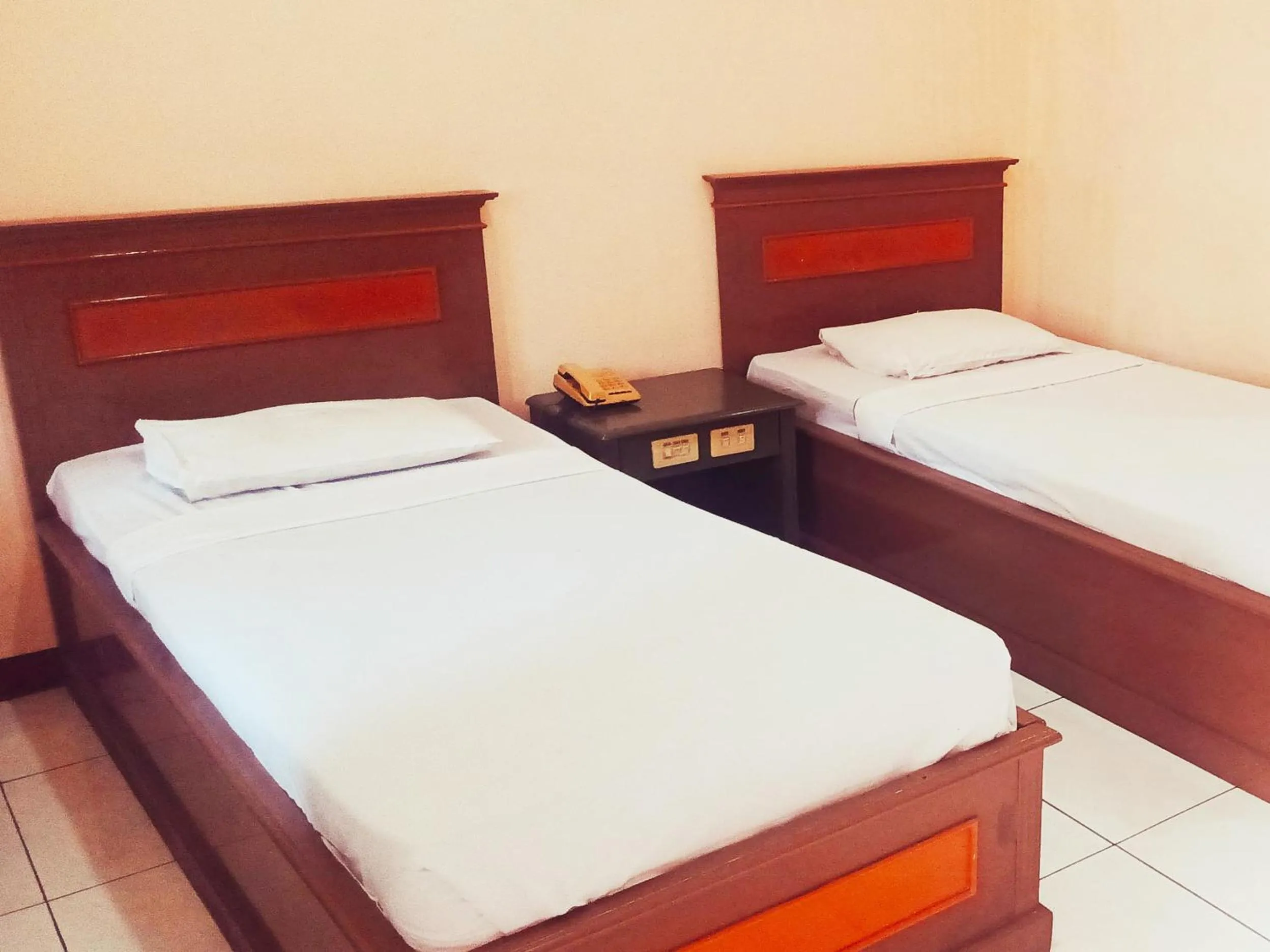 Bed in Hotel Wijaya Purwokerto