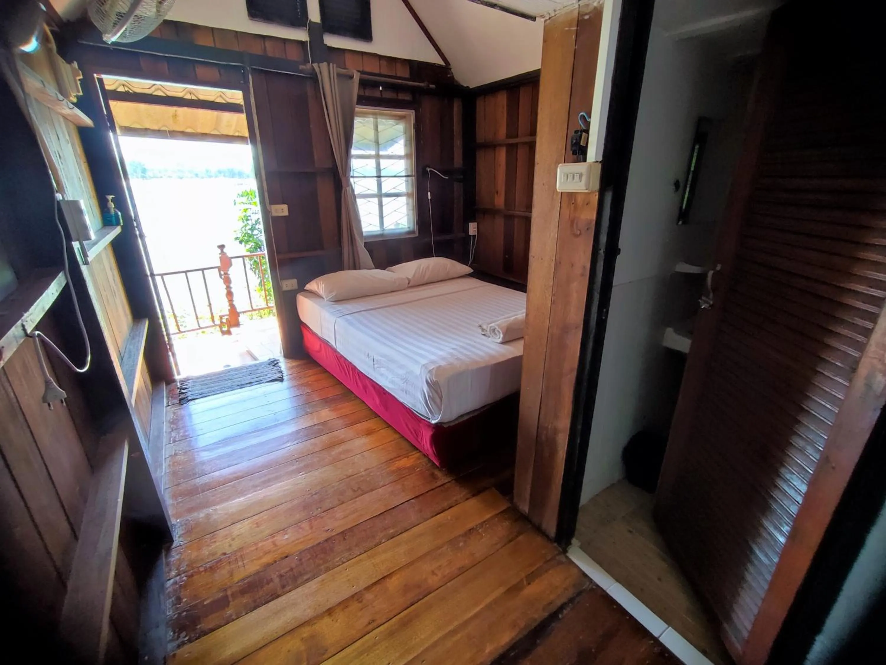Bed in Poseidon Bungalows