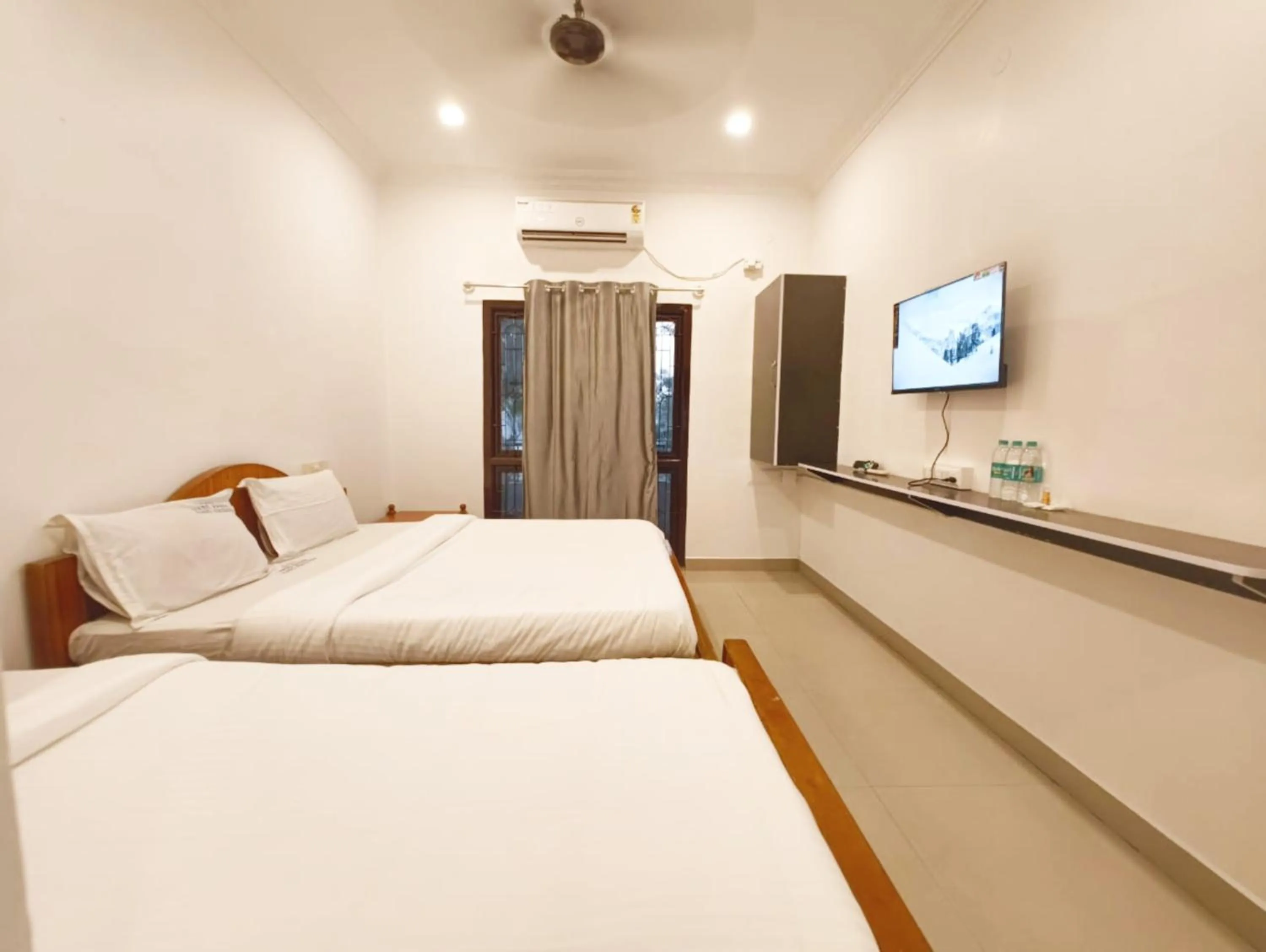 Bedroom, Bed in Hare Rama Hare Krishna - EESHA Hotel