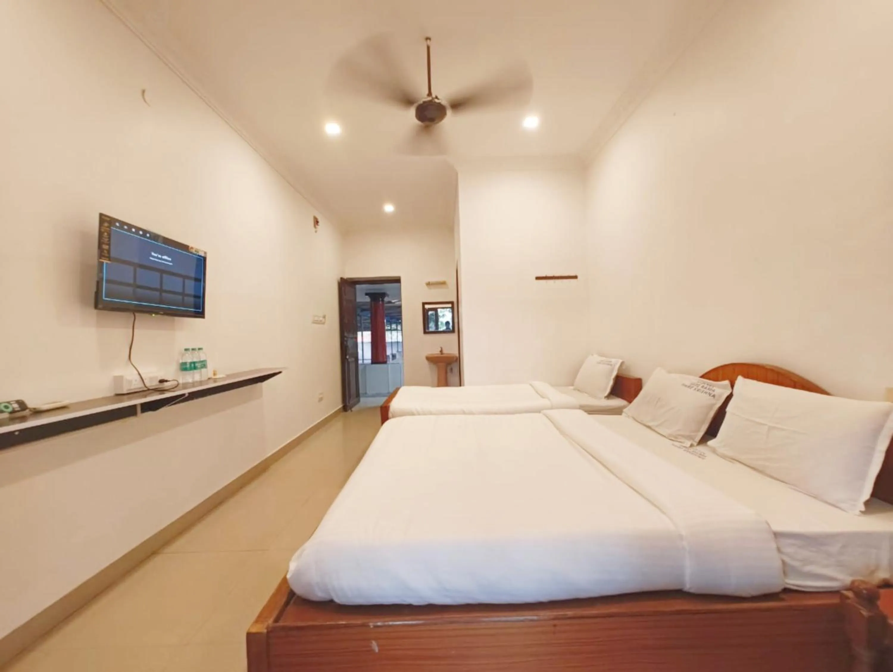 View (from property/room), Bed in Hare Rama Hare Krishna - EESHA Hotel