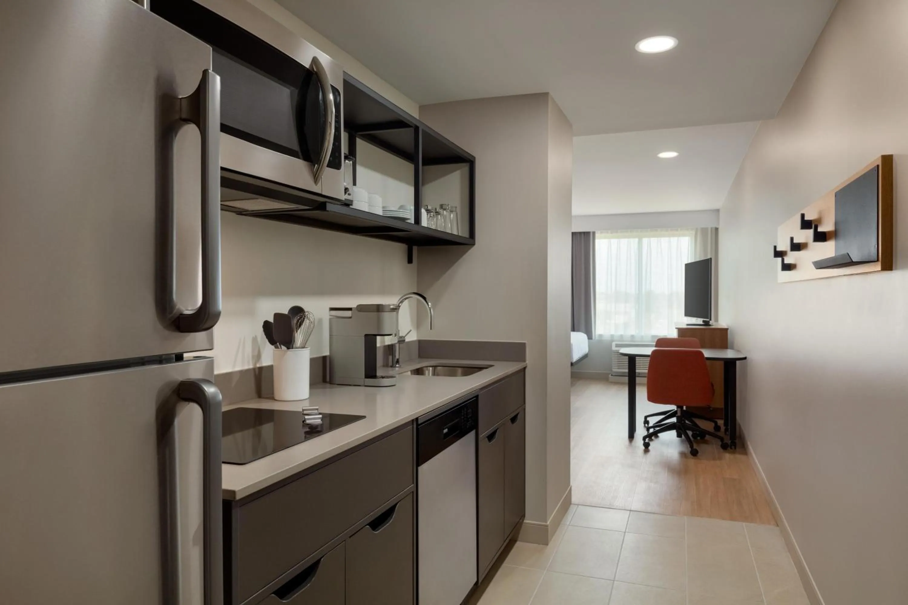 Kitchen or kitchenette in LivSmart Studios By Hilton Kokomo