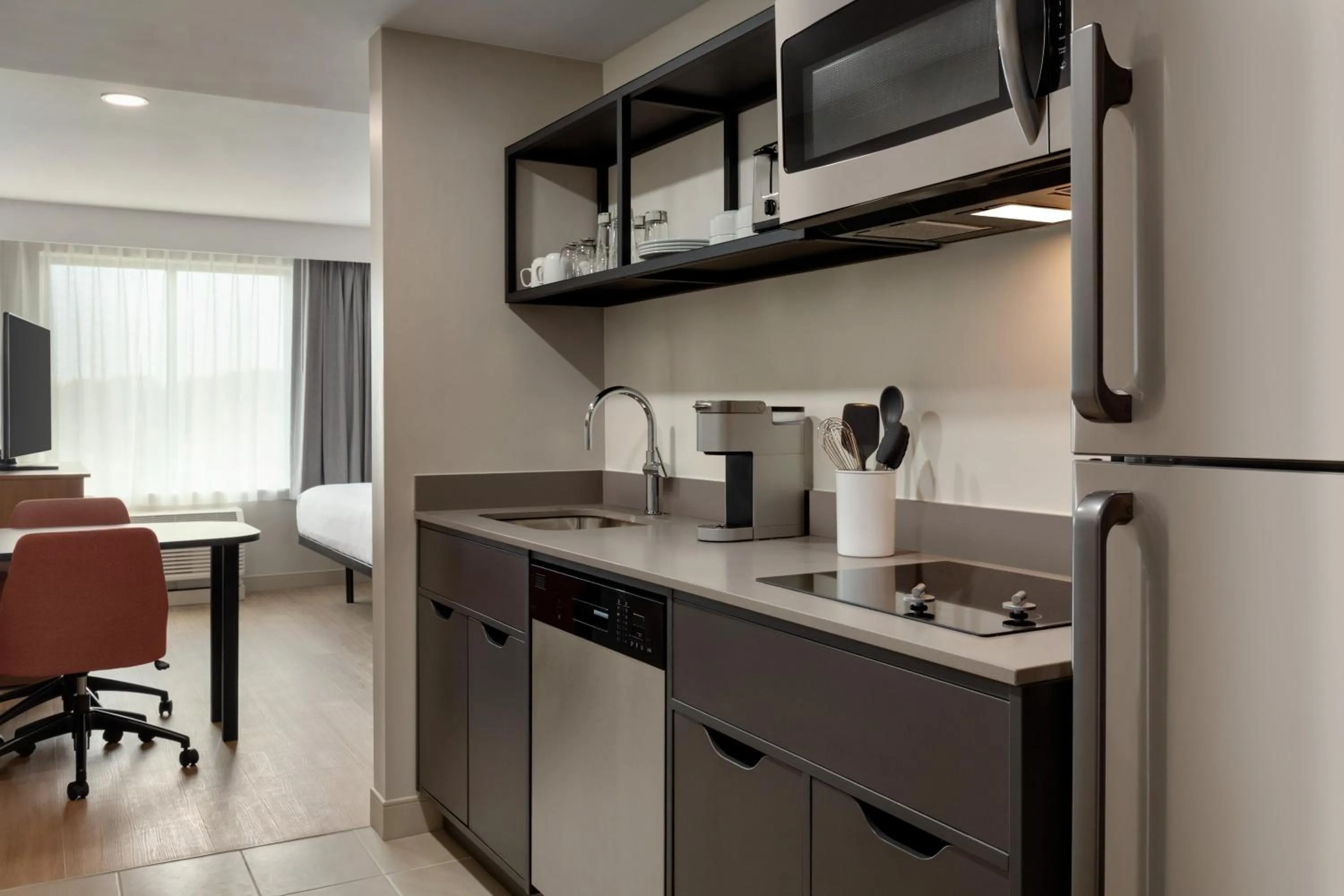 Kitchen or kitchenette in LivSmart Studios By Hilton Kokomo