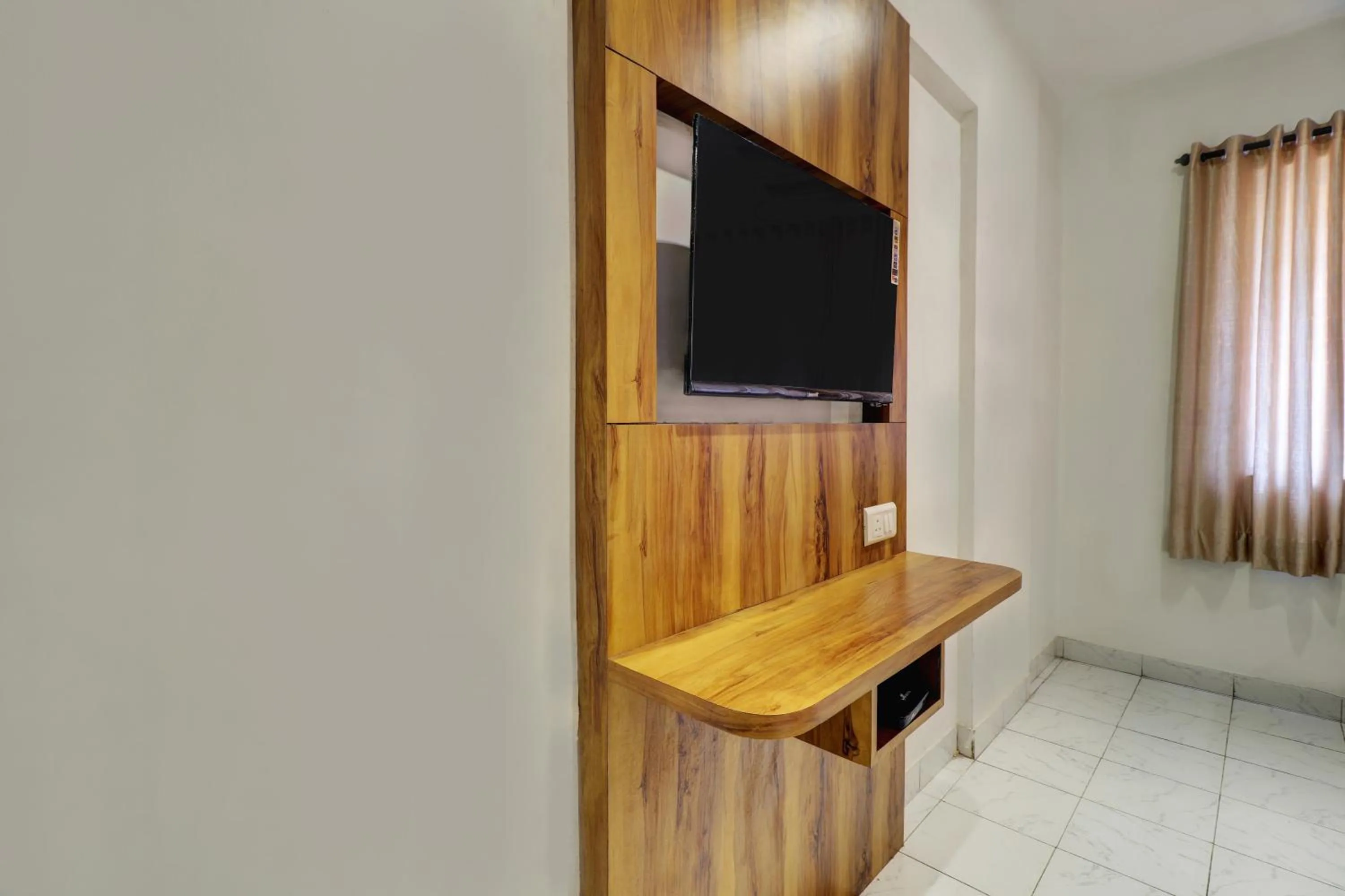 Bedroom in Hotel Kurla Residency