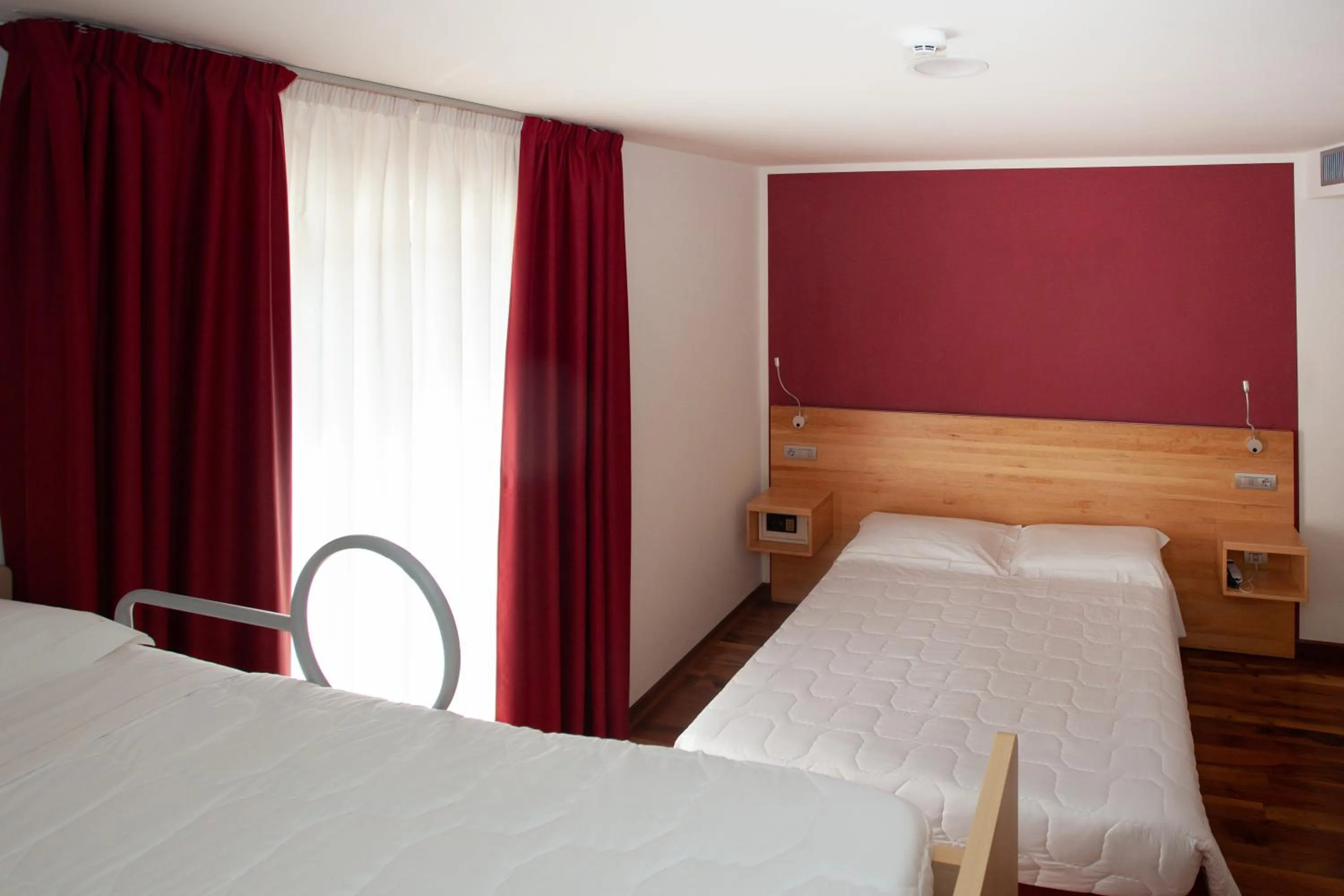 Bed in Hotel Giardino