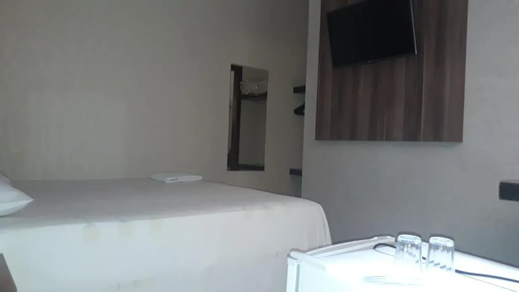 Bed in Solar Plaza Hotel