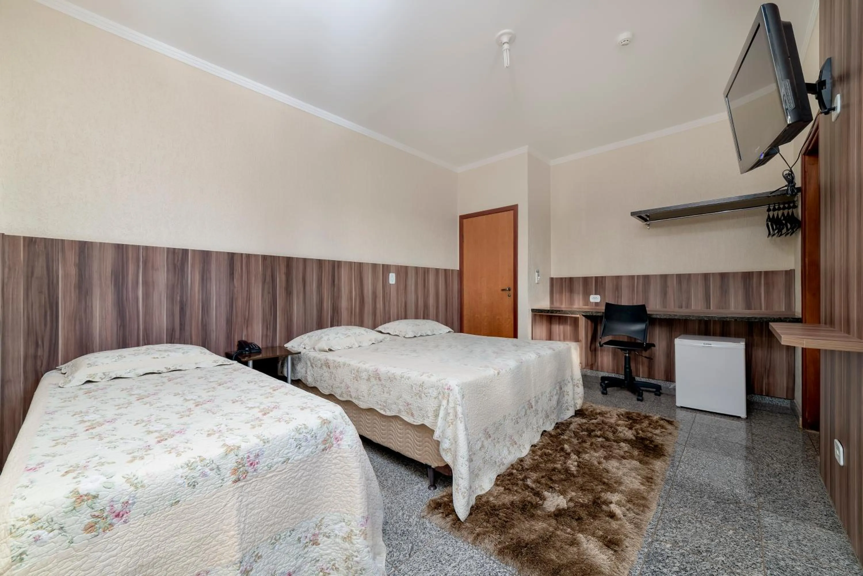 Bed in Solar Plaza Hotel