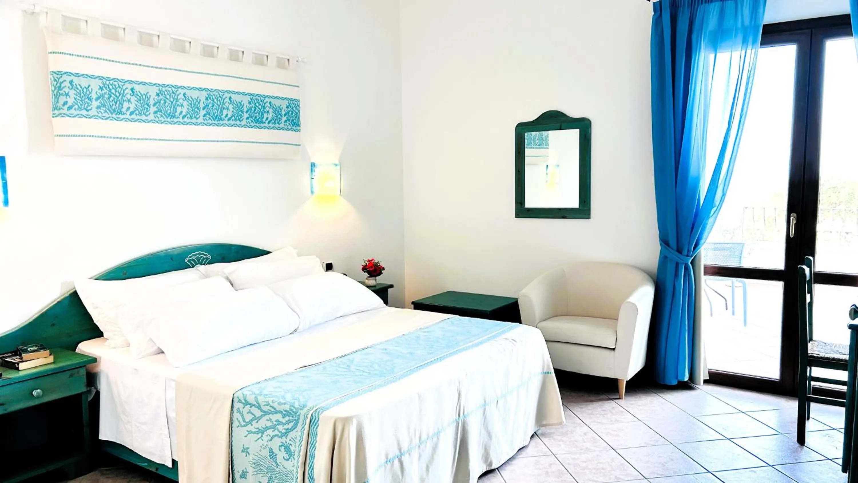 Bed in La Perla Hotel