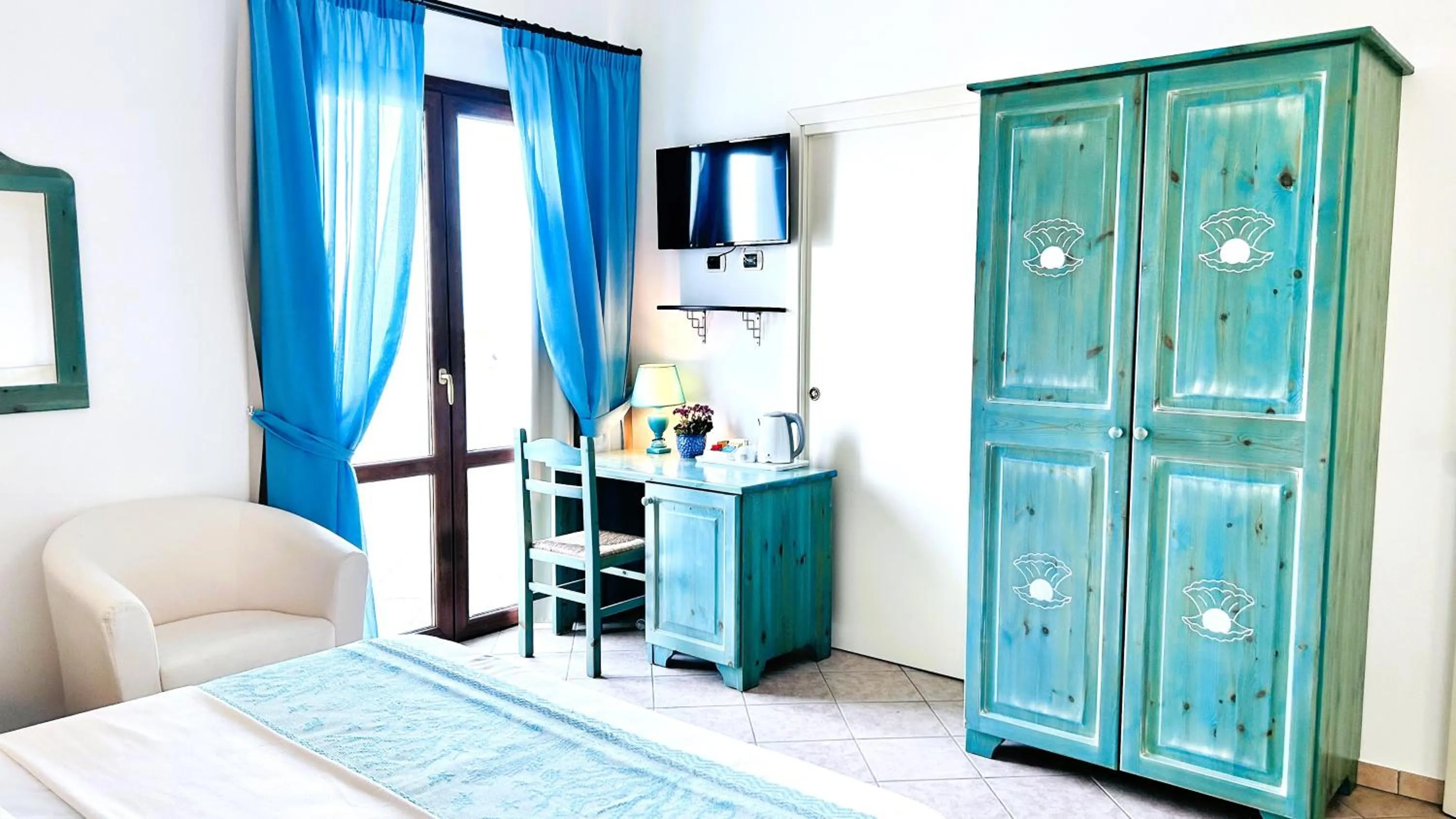 Bed in La Perla Hotel