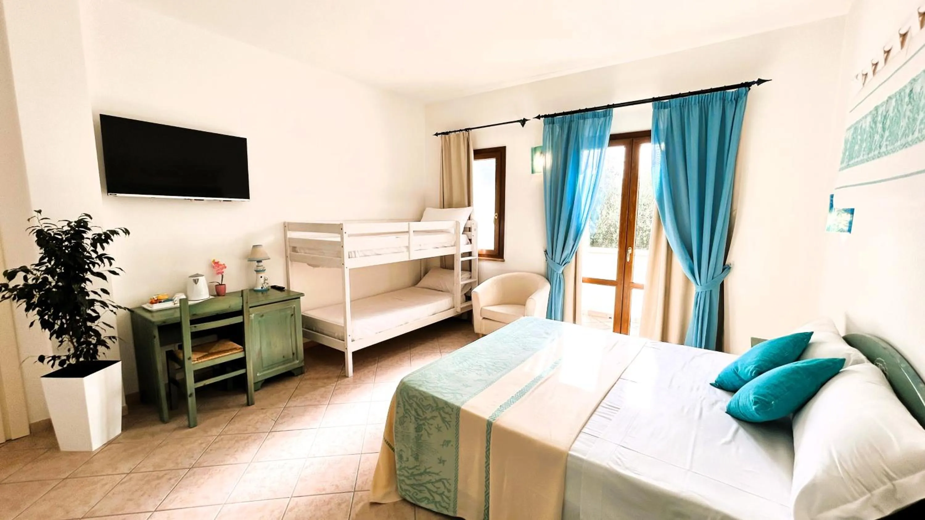 Bed in La Perla Hotel