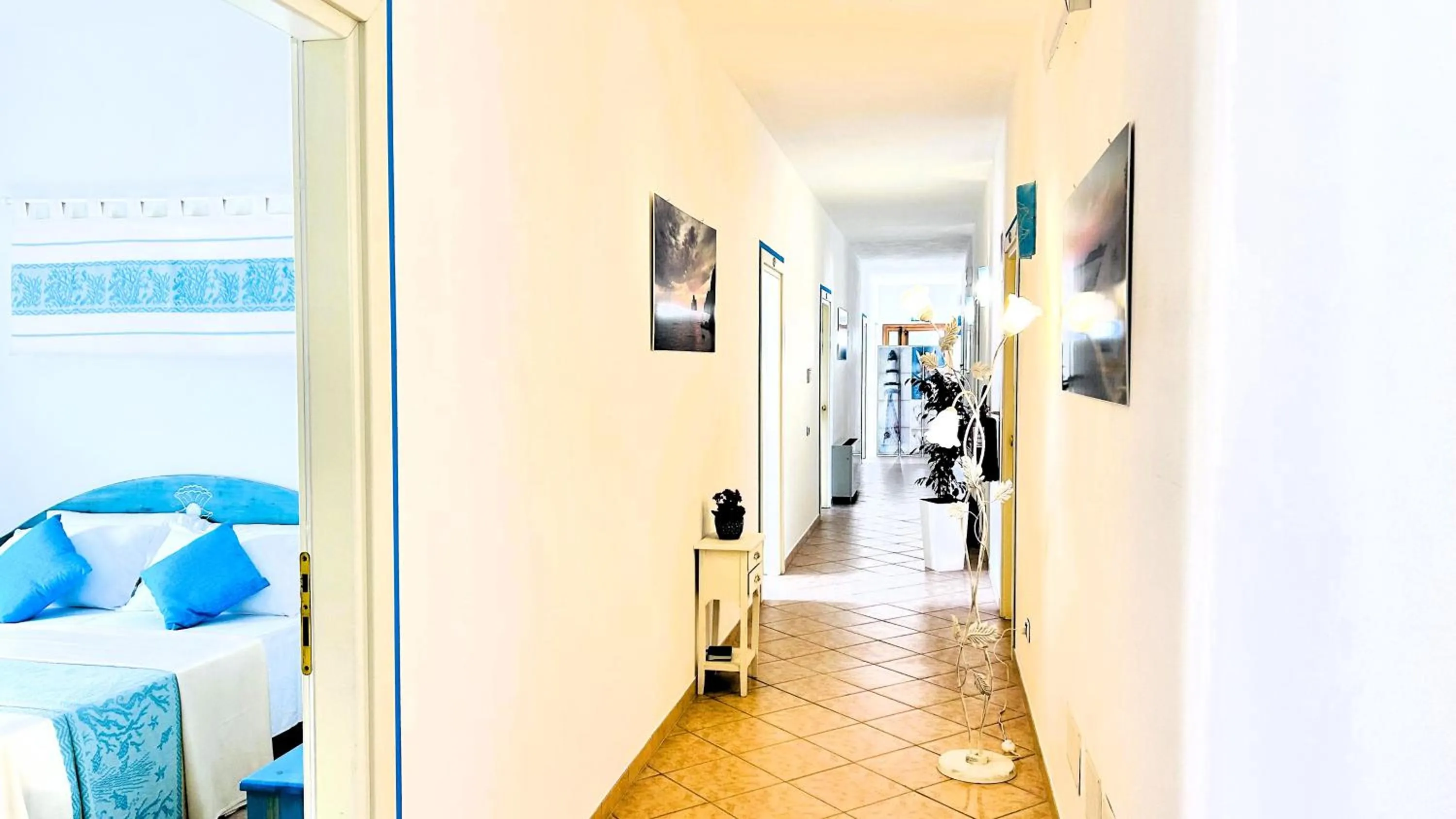 Bed in La Perla Hotel