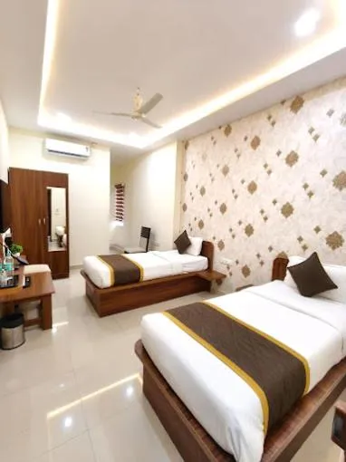 Bed in Hotel Partha Residency