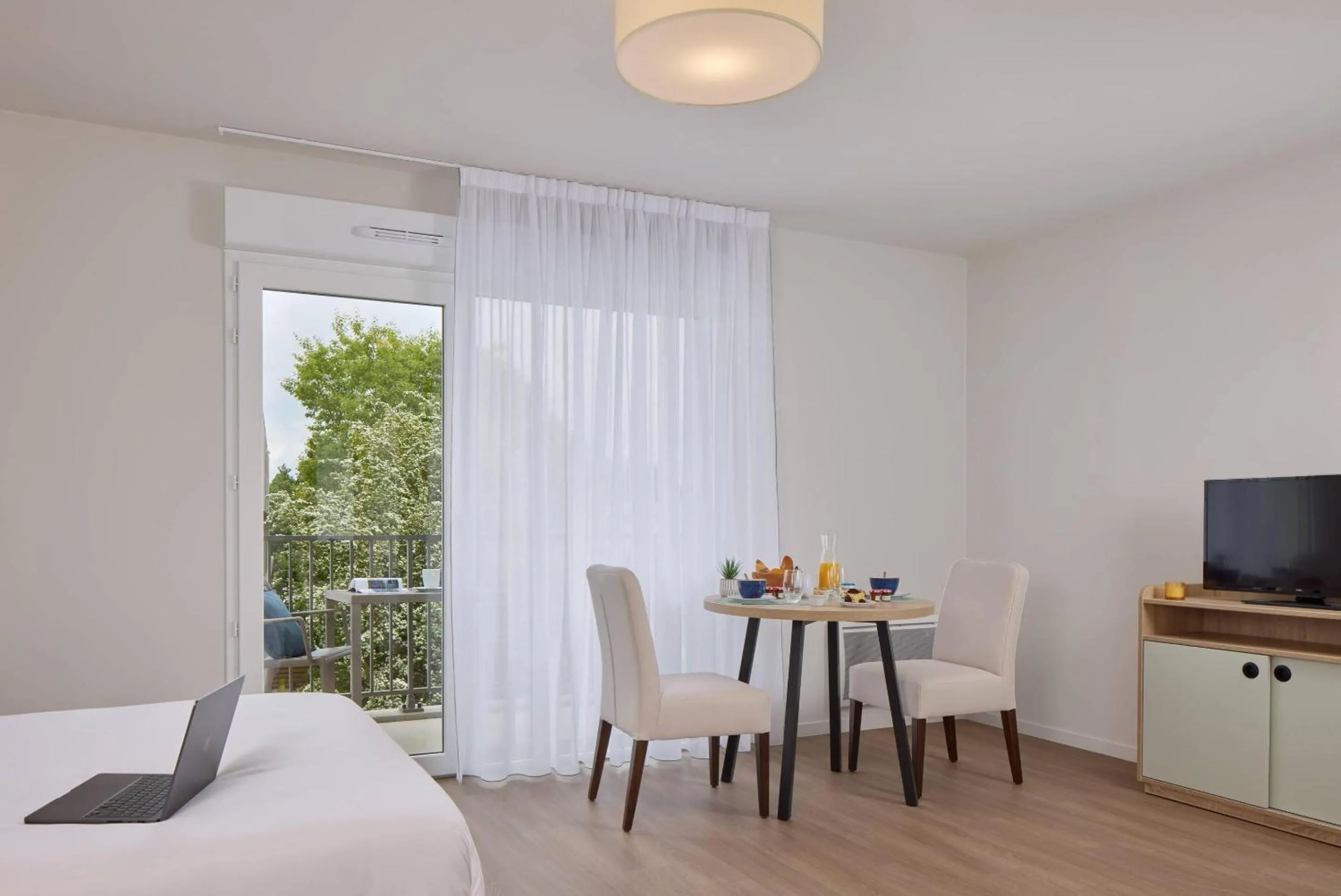 Bedroom, Bed in Zenitude Quality Aparthotel Plerin