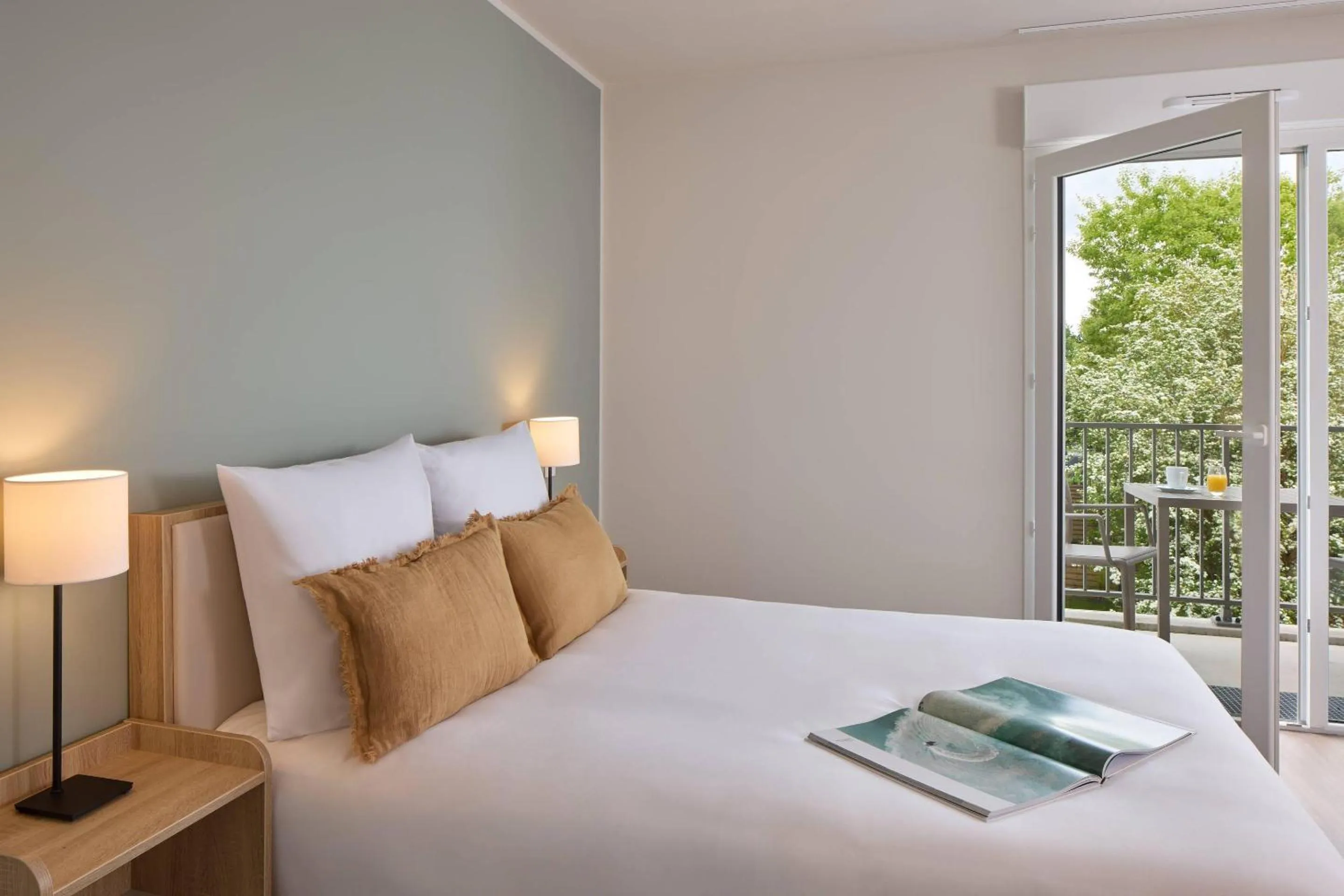 Bedroom, Bed in Zenitude Quality Aparthotel Plerin