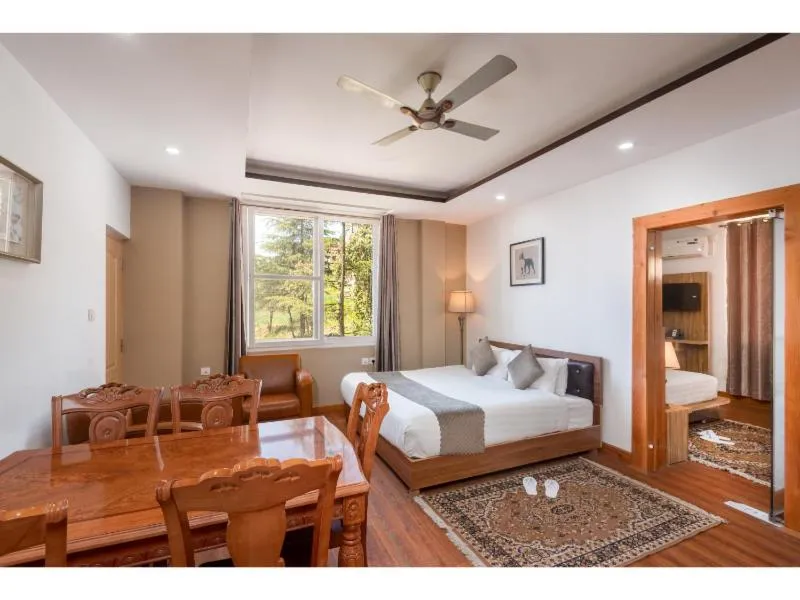 Seating area, Bed in Hotel Shiva Sanctuary by DLS Hotels, McLeod Ganj