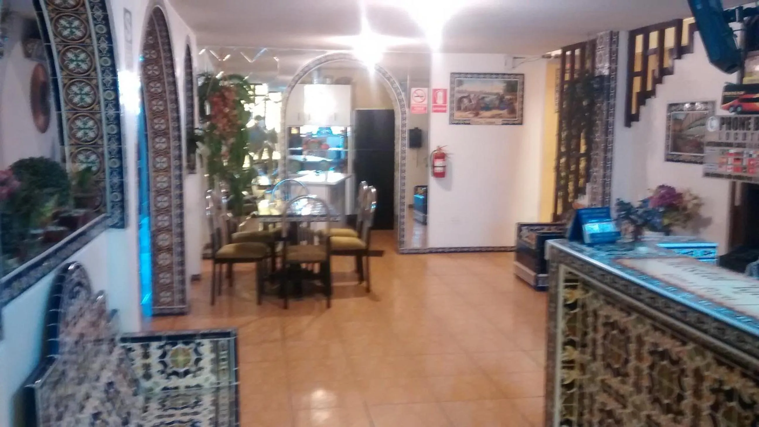 Communal lounge/ TV room in Hostal Iquique