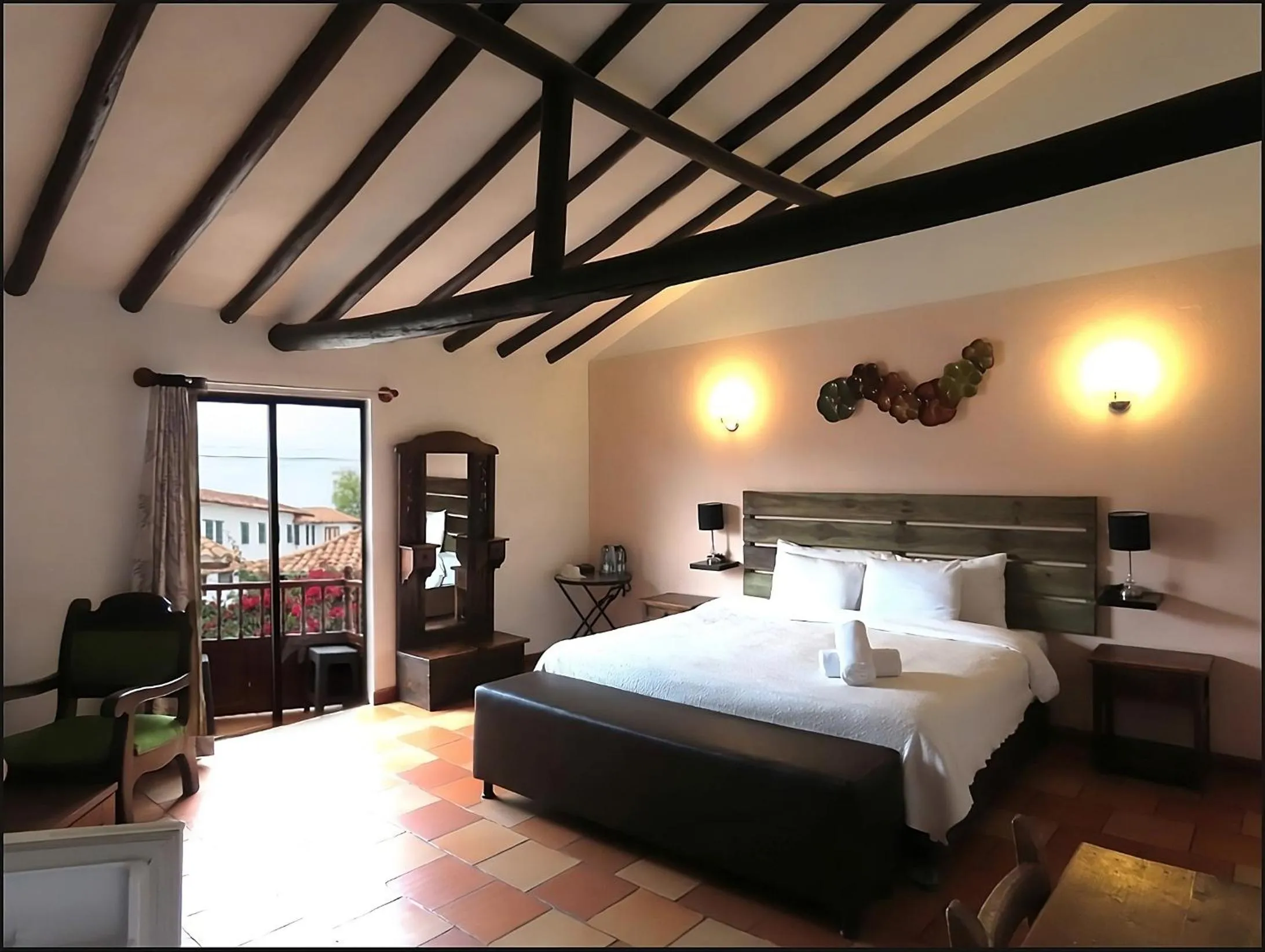 Bed in Aqua Vitae Hotel