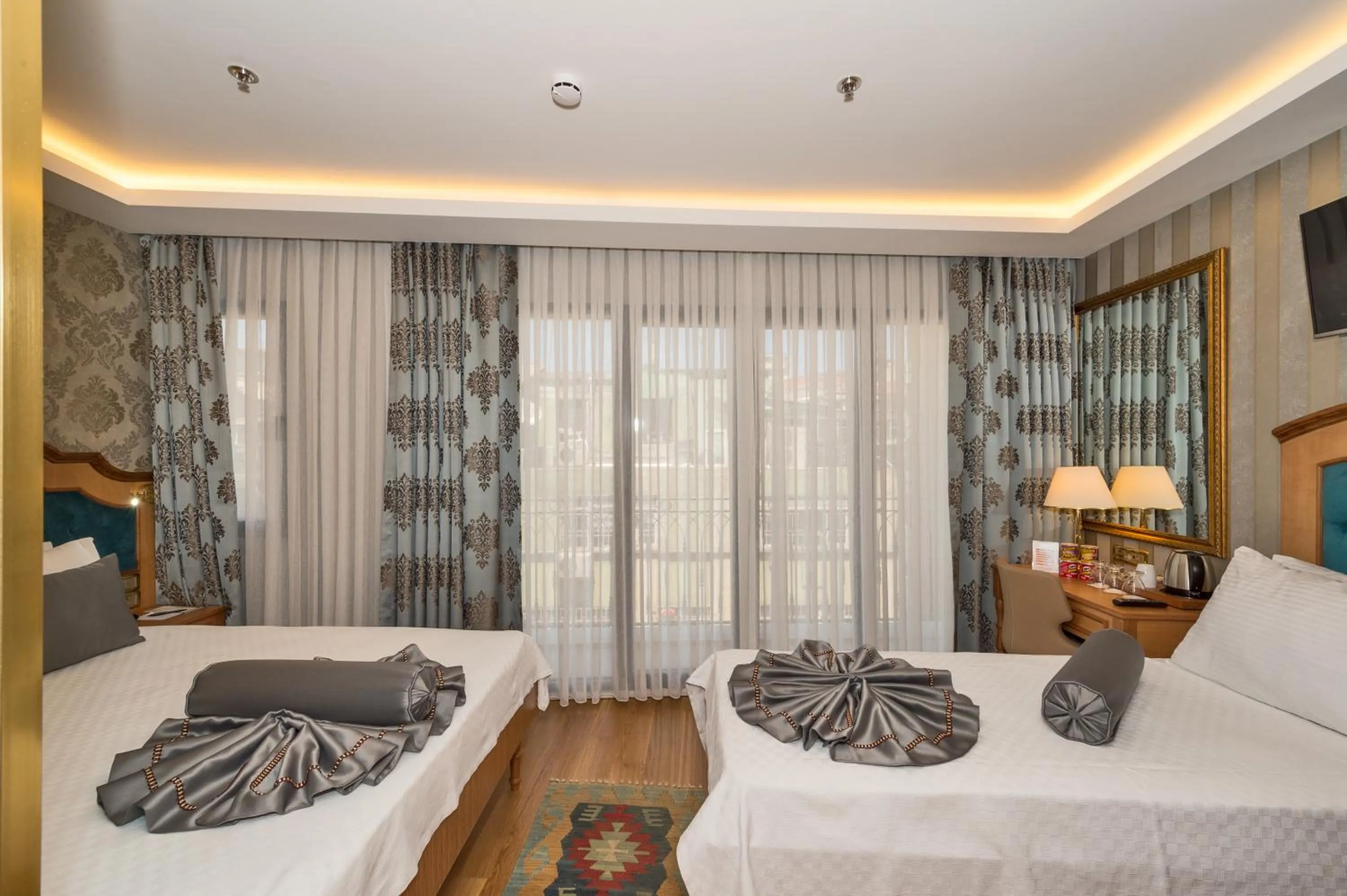 Decorative detail, Bed in Aprilis Gold Hotel - Special Category