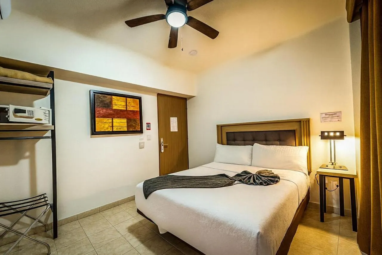 Bed in Hotel Grand Lion