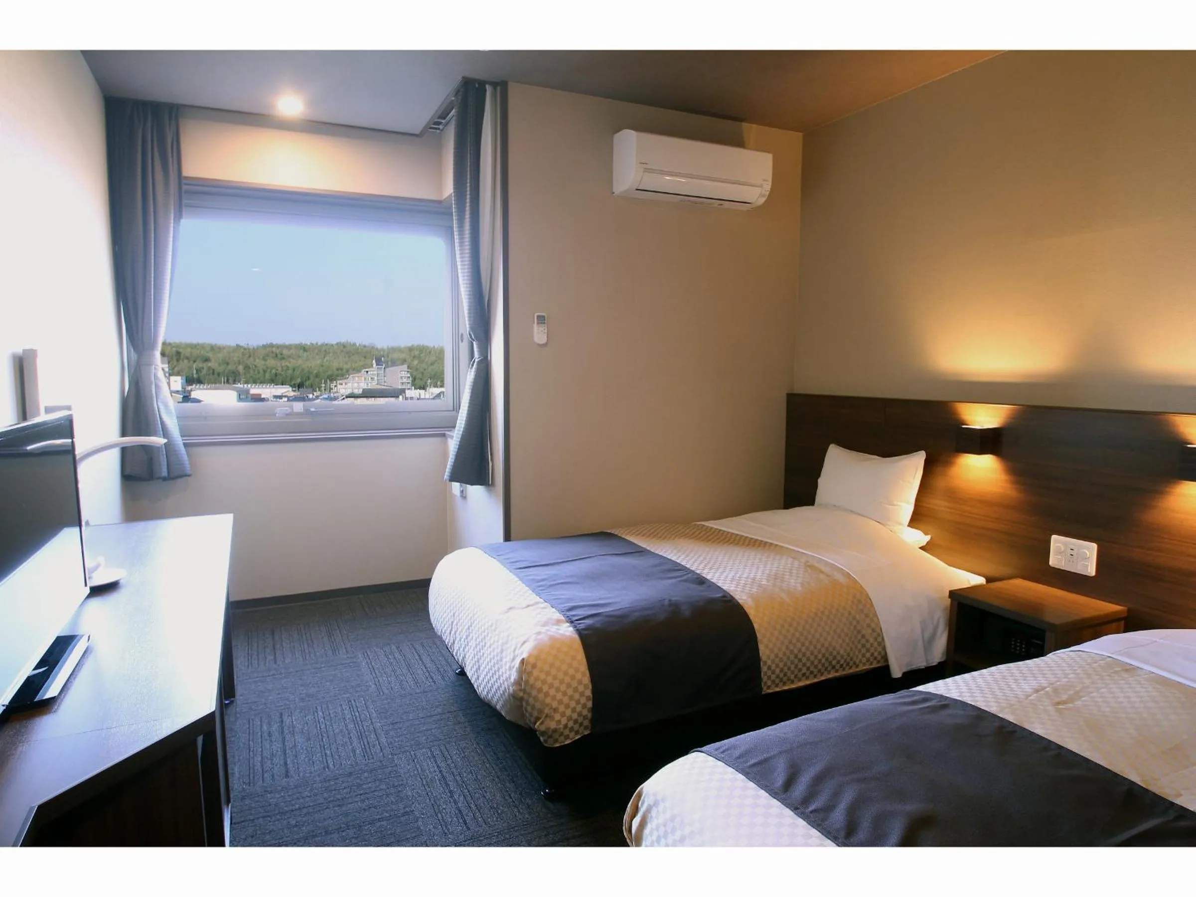 Bed in ホテル京都エミナースManyonoyuHotelKyotoEminence