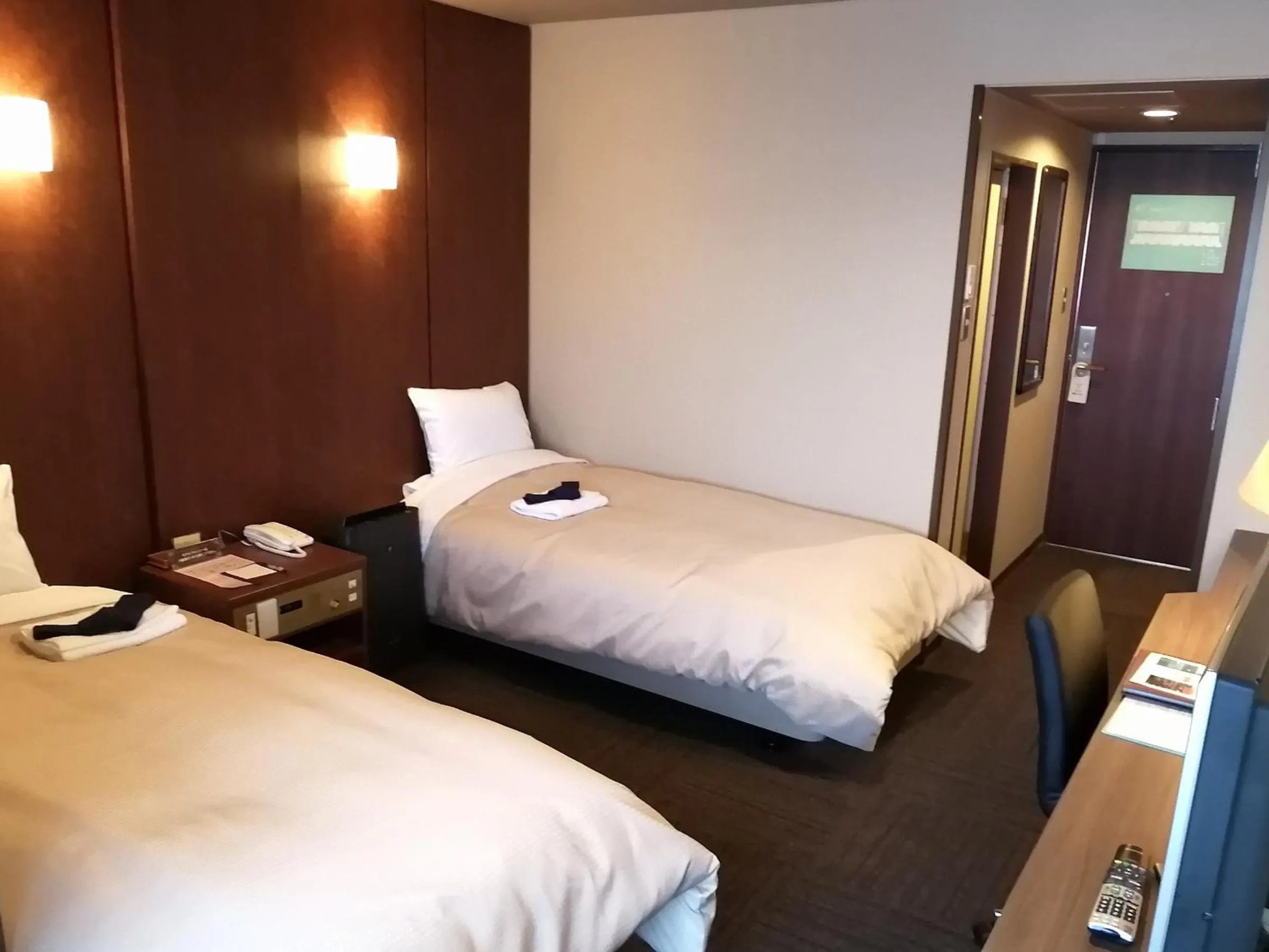 Bed in ホテル京都エミナースManyonoyuHotelKyotoEminence