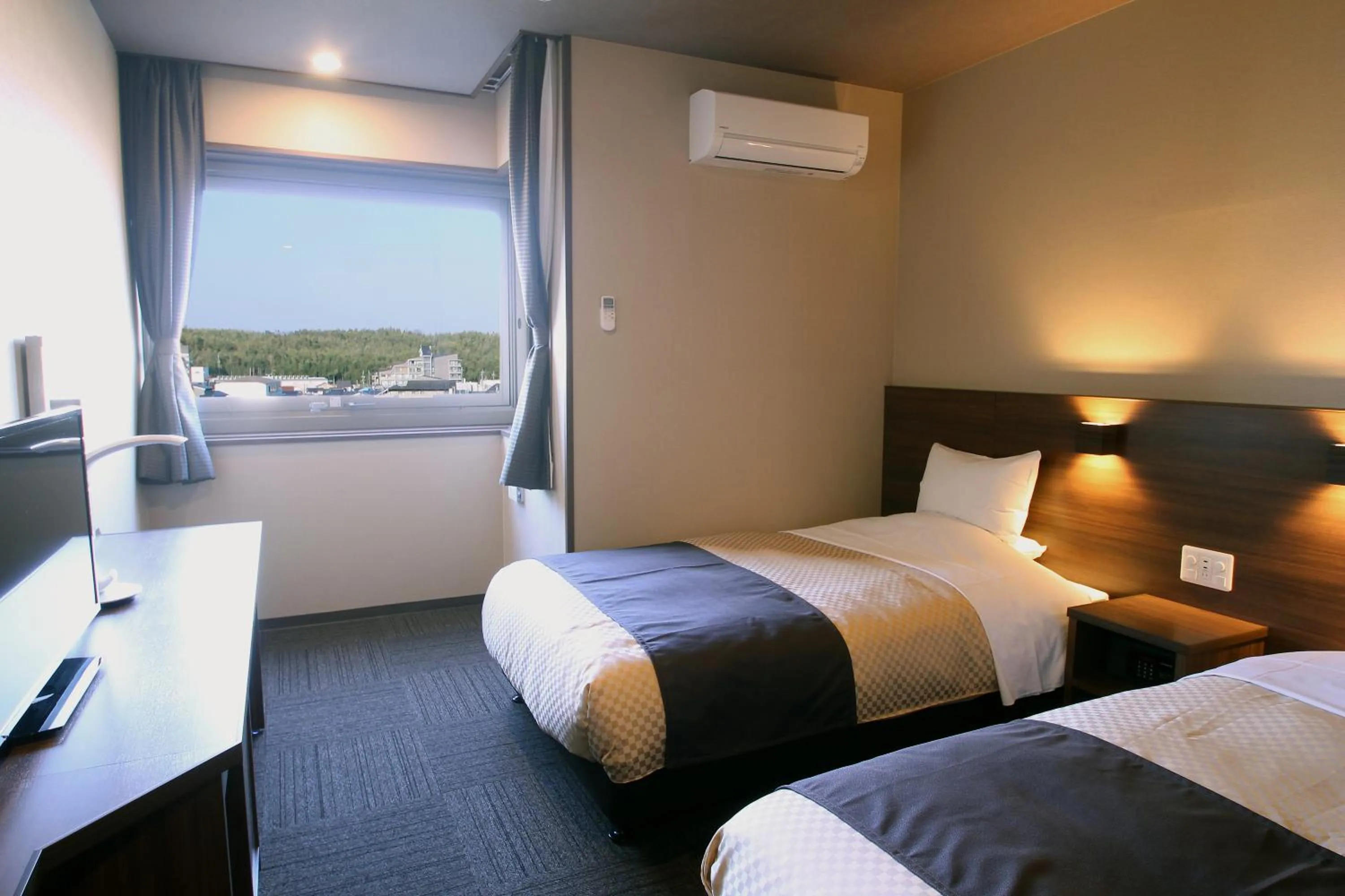 Bed in ホテル京都エミナースManyonoyuHotelKyotoEminence