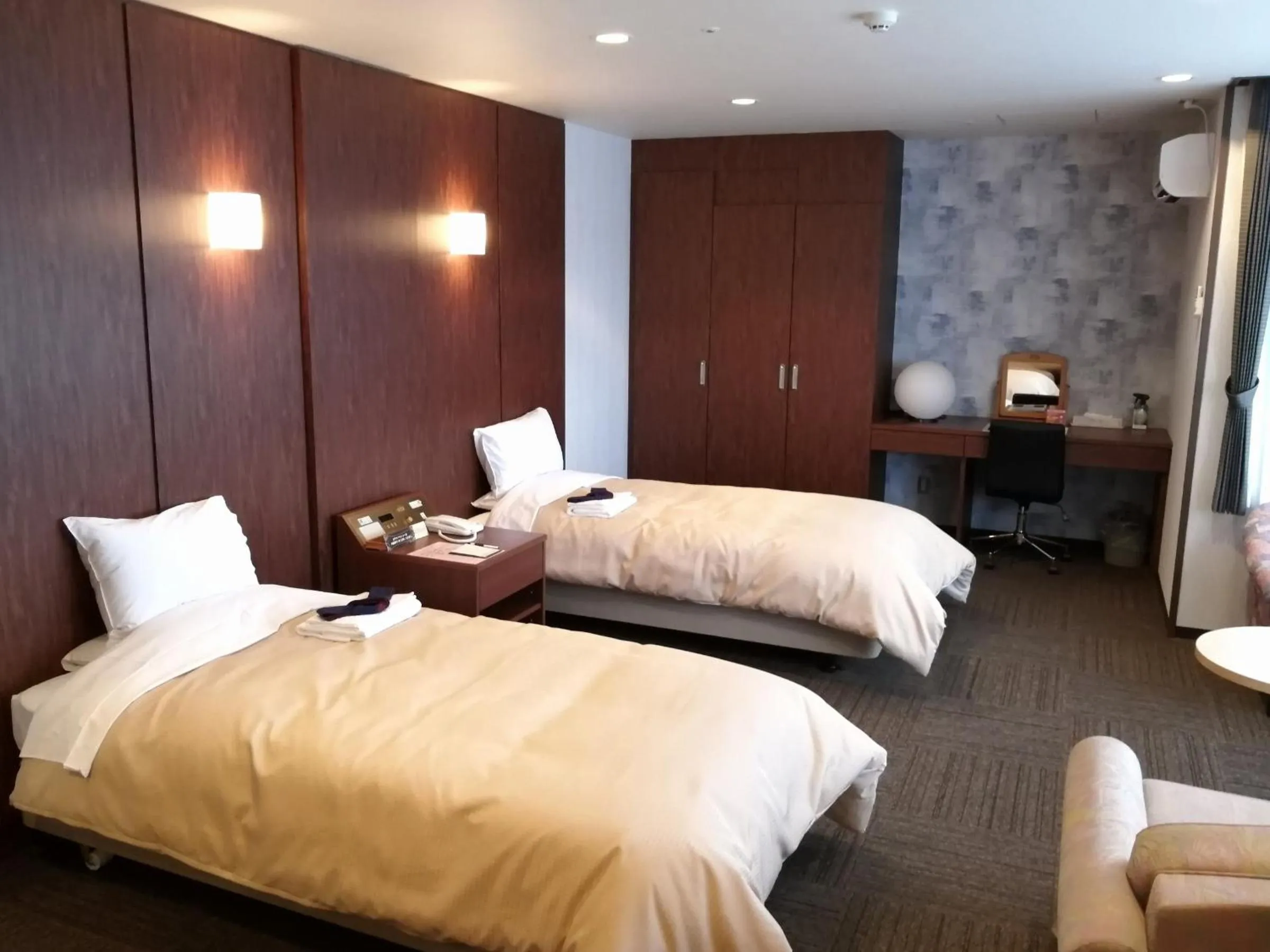 Bed in ホテル京都エミナースManyonoyuHotelKyotoEminence