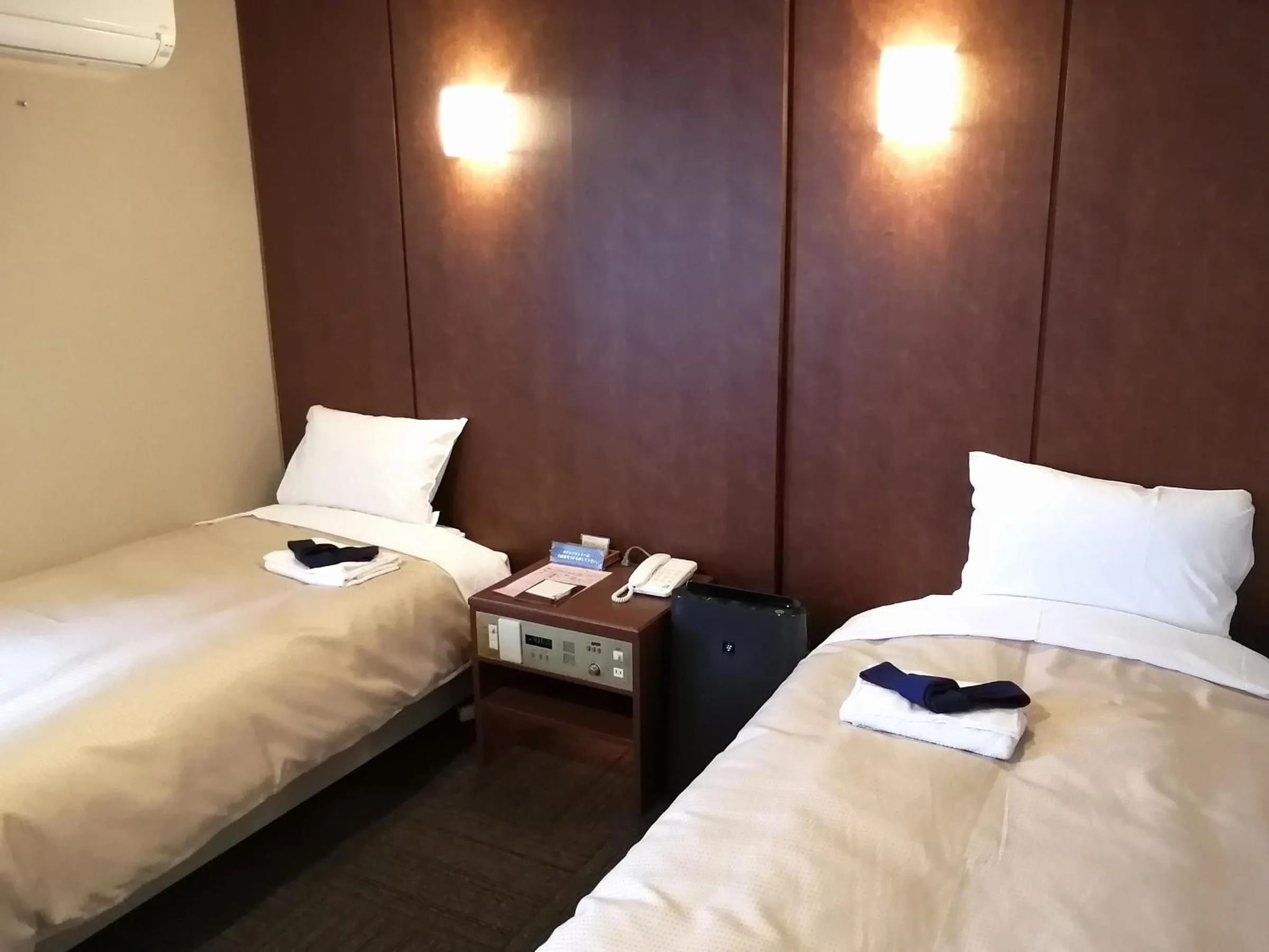 Bed in ホテル京都エミナースManyonoyuHotelKyotoEminence