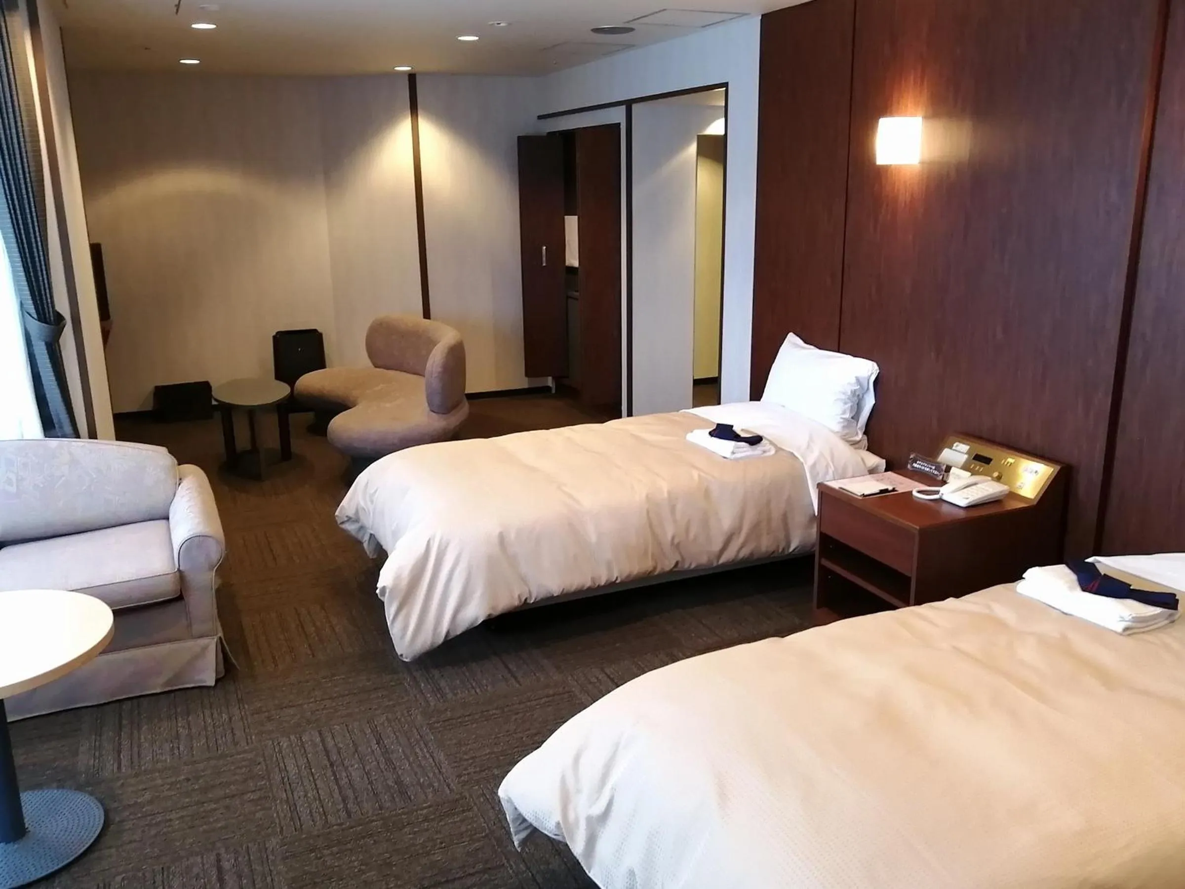 Bed in ホテル京都エミナースManyonoyuHotelKyotoEminence