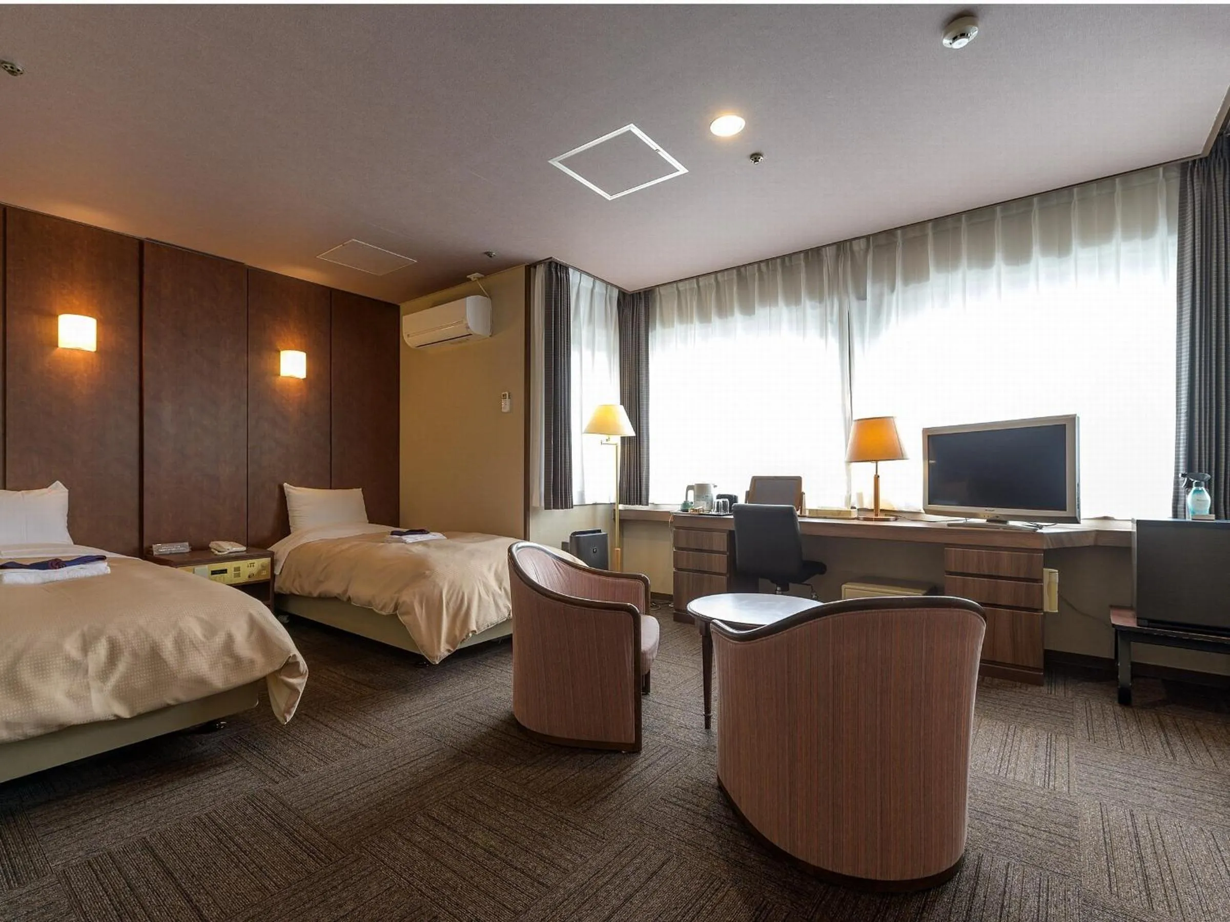 Bed in ホテル京都エミナースManyonoyuHotelKyotoEminence