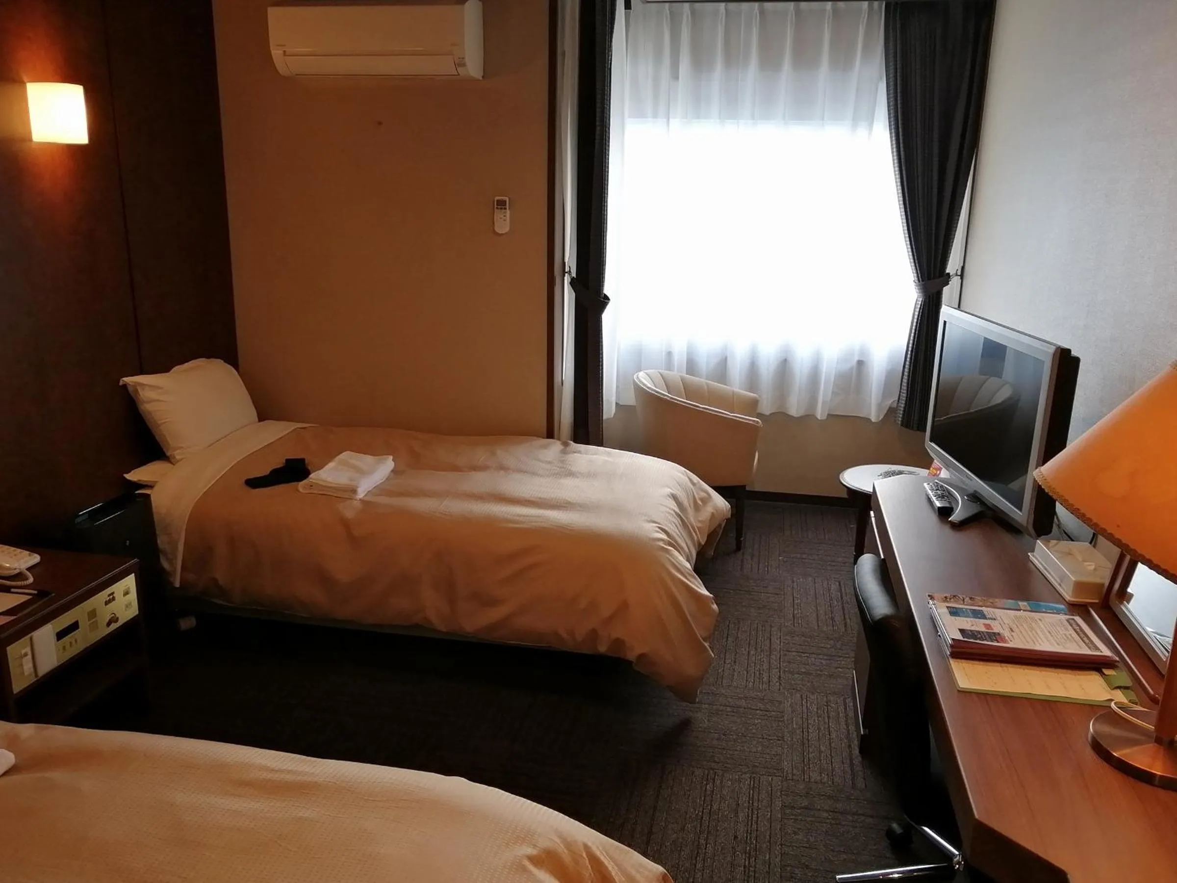 Bed in ホテル京都エミナースManyonoyuHotelKyotoEminence