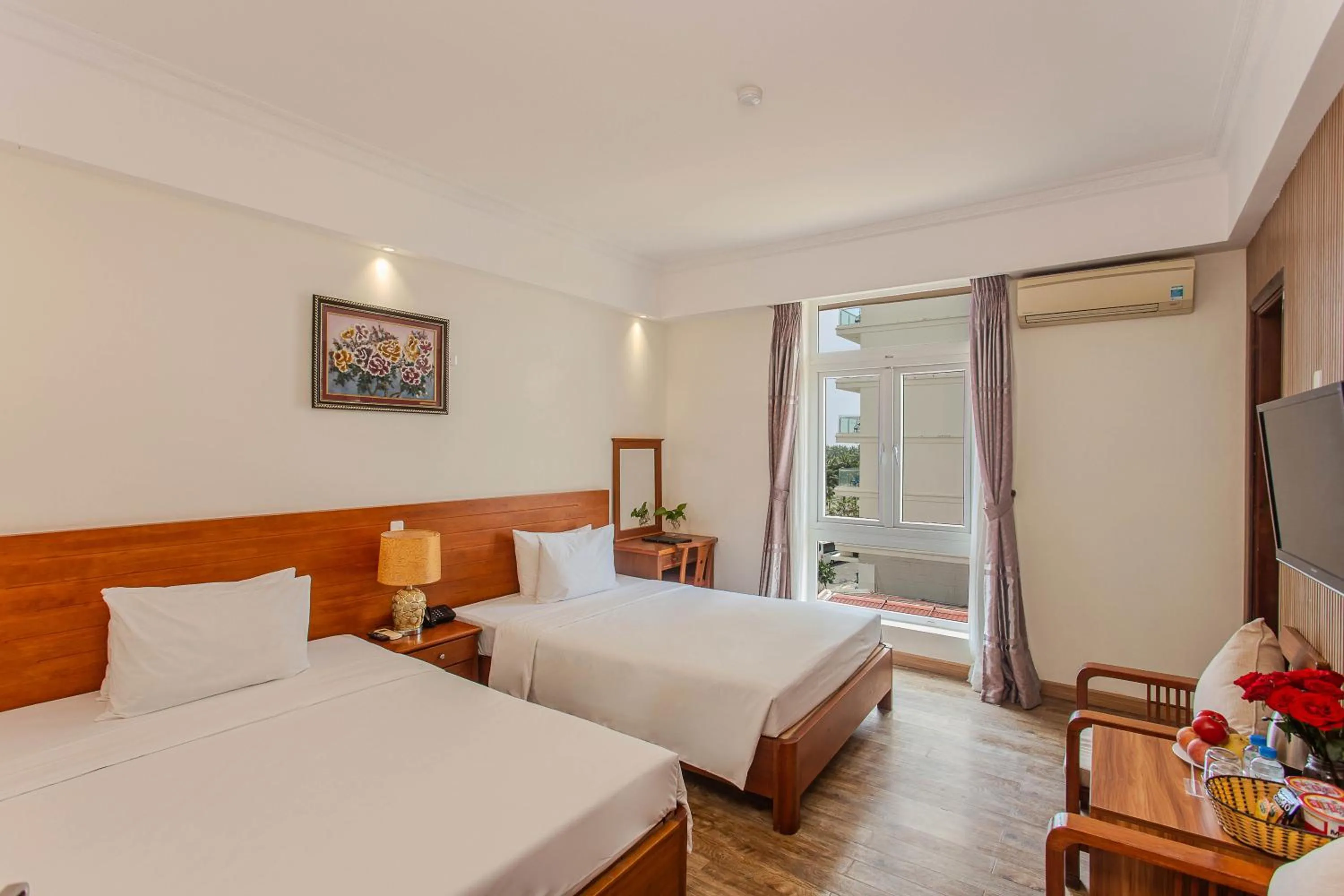 Photo of the whole room, Bed in Seavitel Danang Beach Hotel