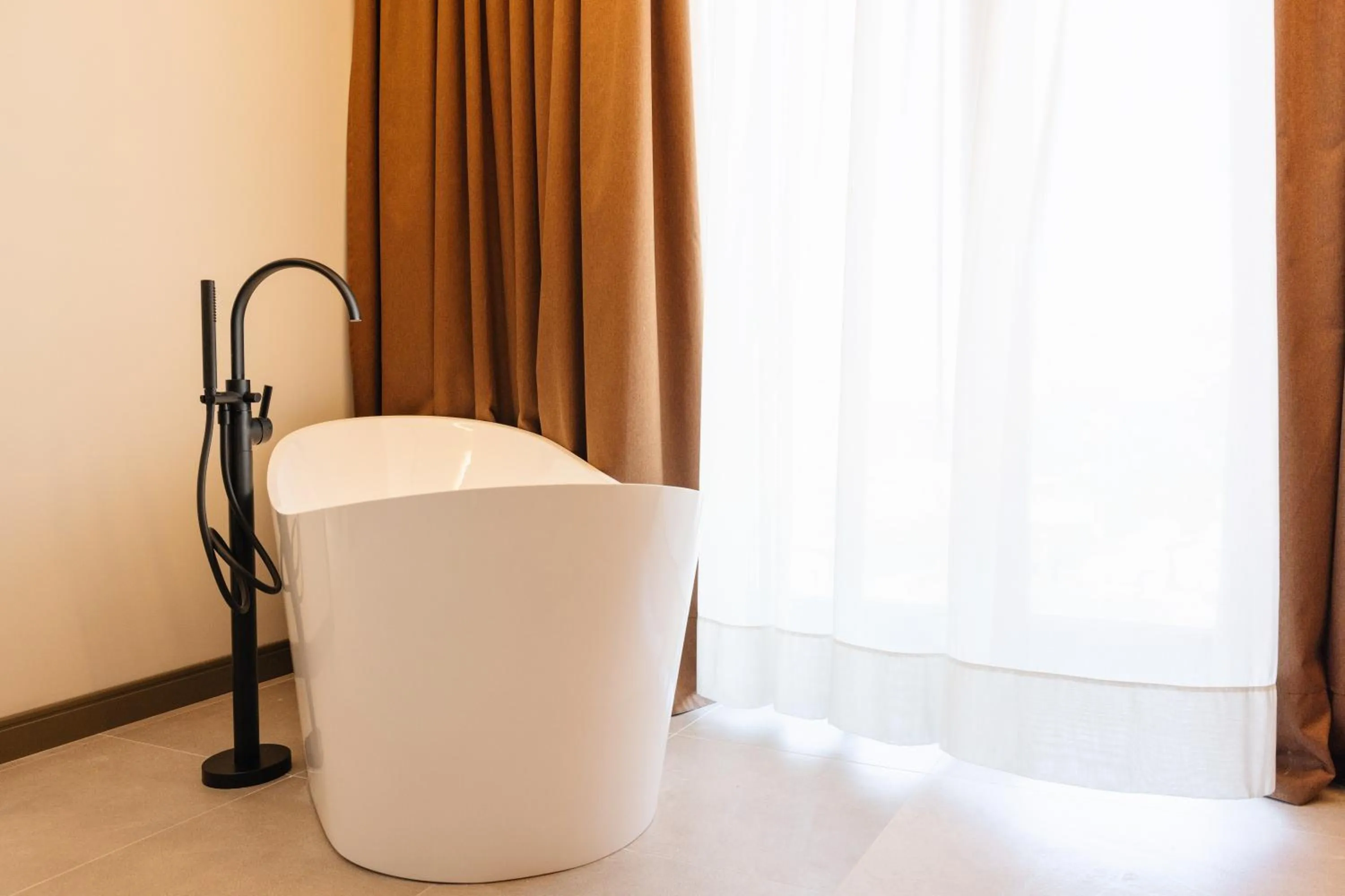 Bedroom in Grand Duka Hotel & SPA